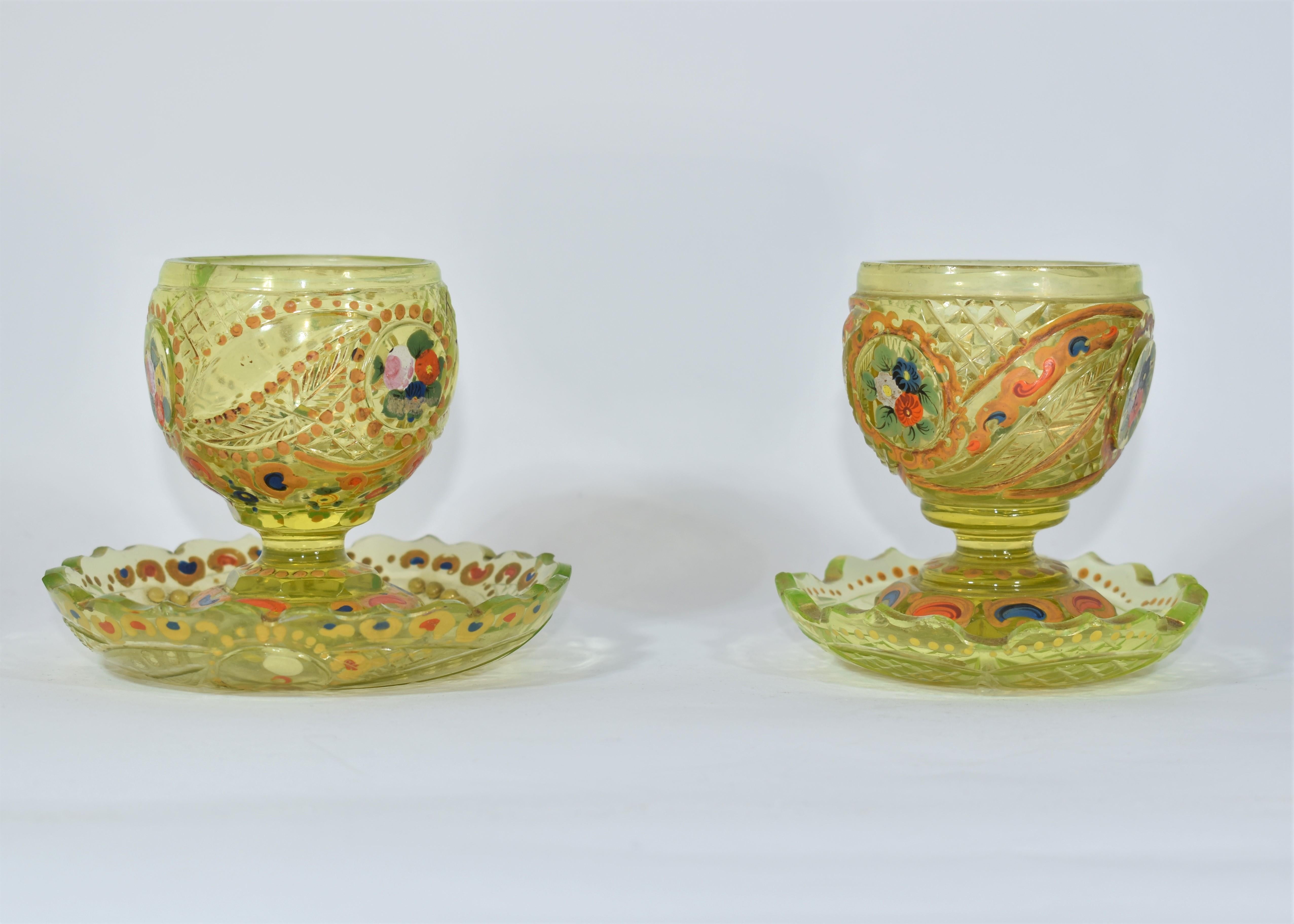 two sugar bowls with matching plates in Bohmeian enamelled uranium cut-glass
19th Century
Variously cut and richly decorated with flowers and gilded enamel.
Made by Bohemin glass manufacturers for the Islamic (Ottoman or Persian) market.
