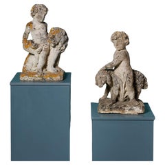 Two Antique Limestone Ornaments of Putti with Lion & Sheep