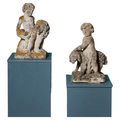 Dos Adornos Antiguos de Piedra Caliza de Putti con León y Oveja