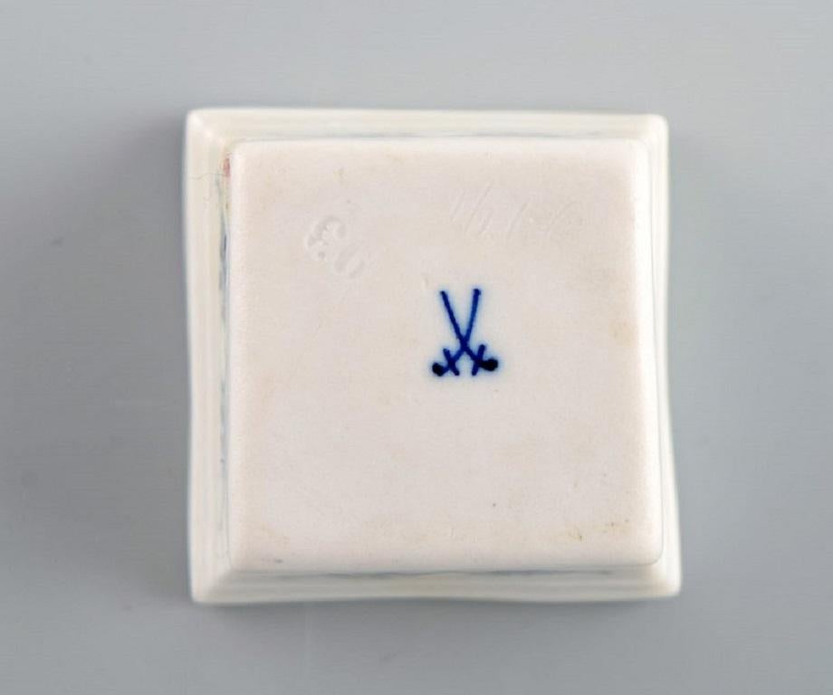 Early 20th Century Two antique Meissen Blue Onion salt cellars in hand-painted porcelain.