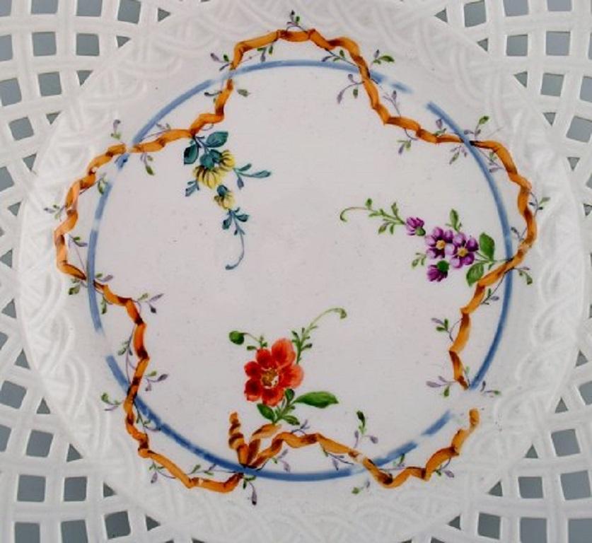 Empire Two Antique Meissen Plates in Pierced Porcelain with Hand Painted Floral Motifs For Sale