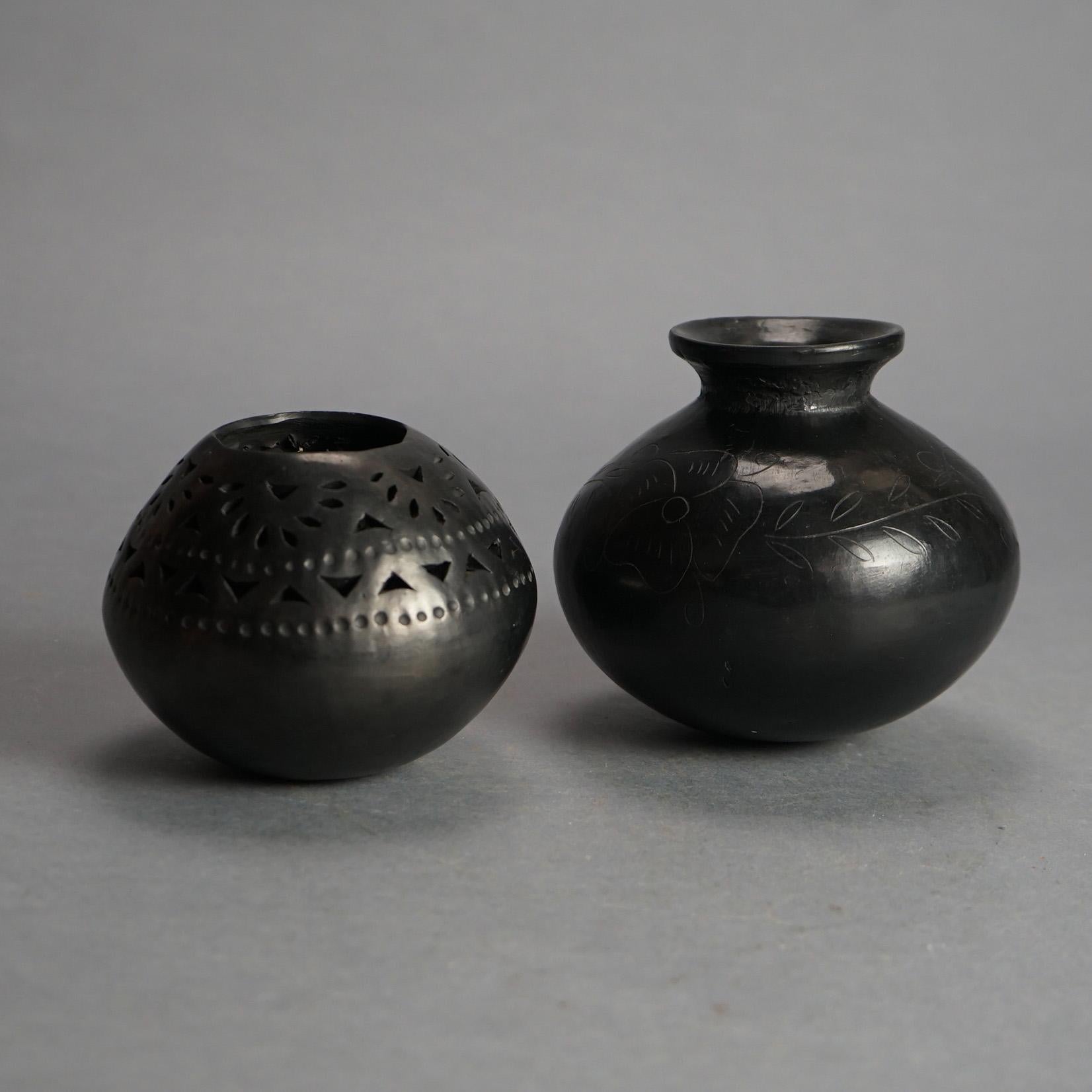 Two Antique Mexican Folk Art Black Reticulated & Incised Pottery Vases c1920

Measures - 4.75