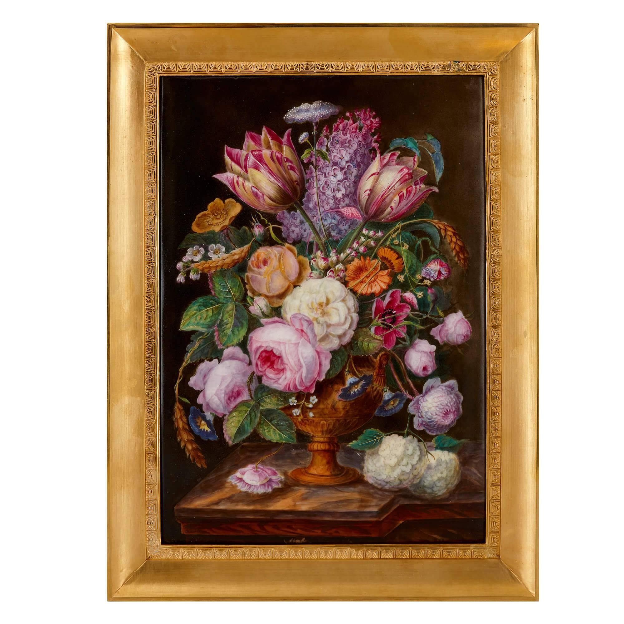 These delicate porcelain plaques are a vision of natural beauty in wild abundance. Each plaque, rectangular in shape, depicts a still life painting of a bountiful floral arrangement in an urn, set against a contrasting dark brown backdrop. The