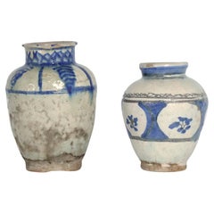 Two Antique Persian Glazed Blue and White Terra Cotta Vases
