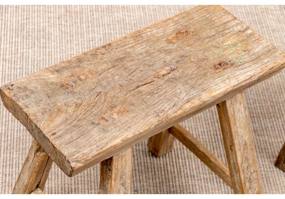 Primitif Two Antique Rustic Hardwood Stools en vente