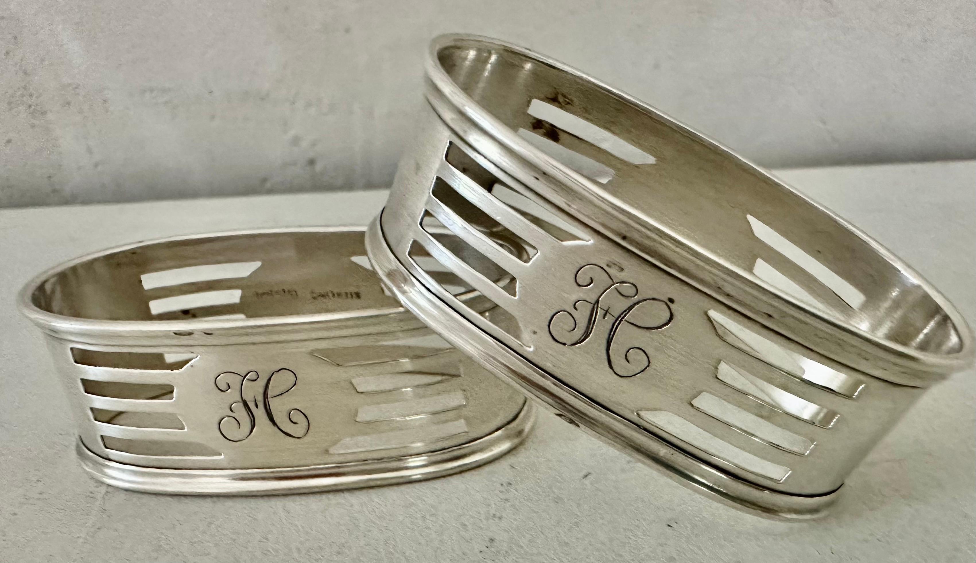 Elegant pair of oval Sterling napkin rings both stamped 
