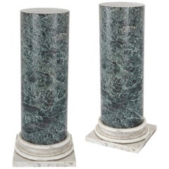 Two antique white and green marble column pedestals