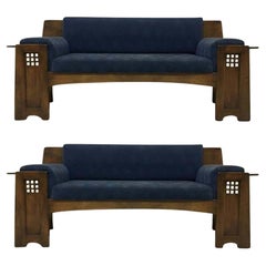 An Architectural Oak Settee or Sofa in the Style of Charles Rennie Mackintosh