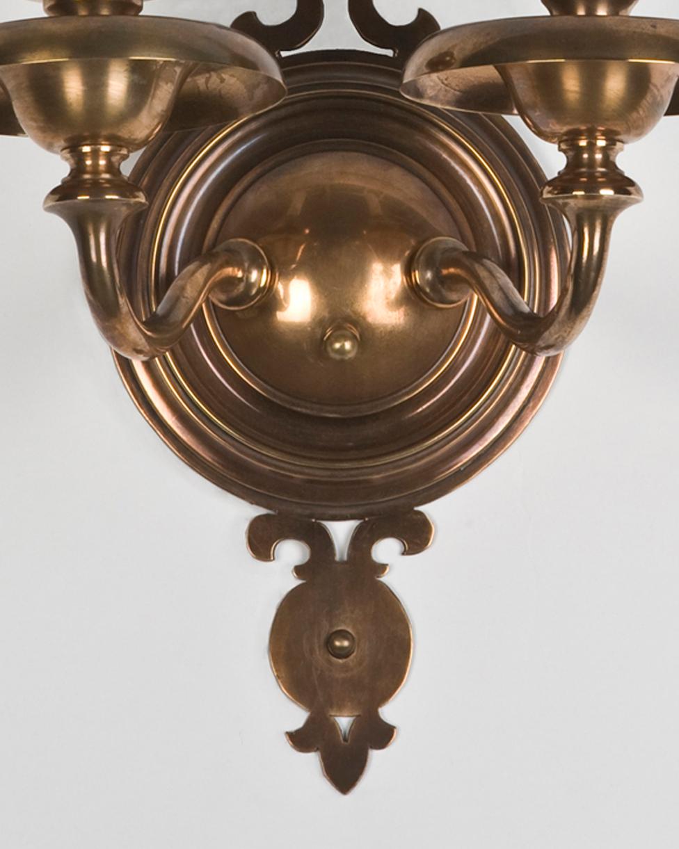 American Two Arm Aged Bronze Sconces with Pierced Finials by Bradley and Hubbard c. 1920s For Sale