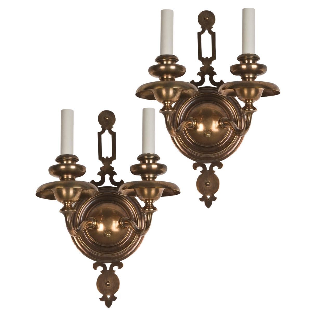 Two Arm Aged Bronze Sconces with Pierced Finials by Bradley and Hubbard c. 1920s For Sale