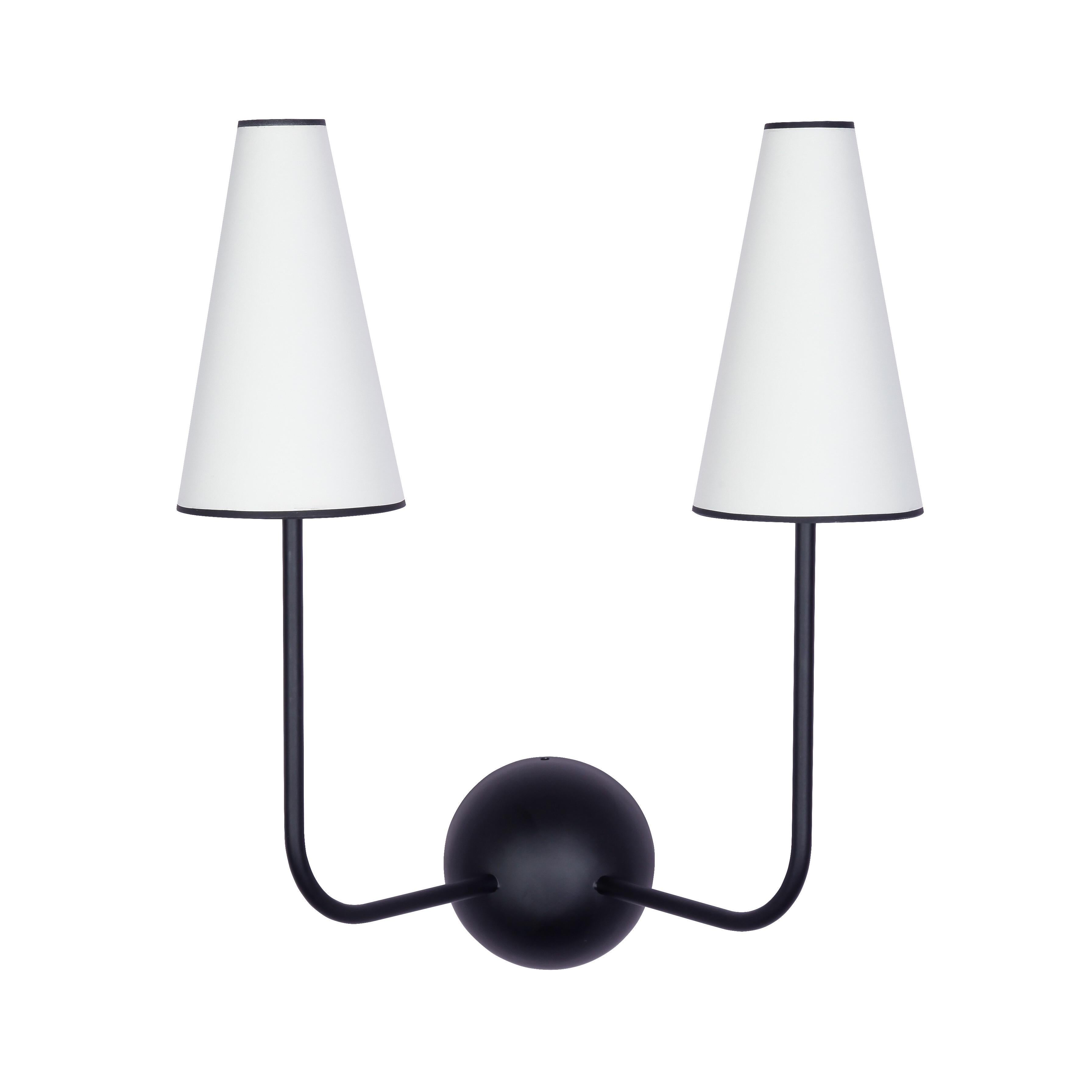 Two-arm black wall lamp in the style of Jean Royère. Handcrafted in Los Angeles in the workshop of noted French designer and antiques dealer Denis de le Mesiere, who pays homage to the work of Jean Royère with scrupulous attention to detail and