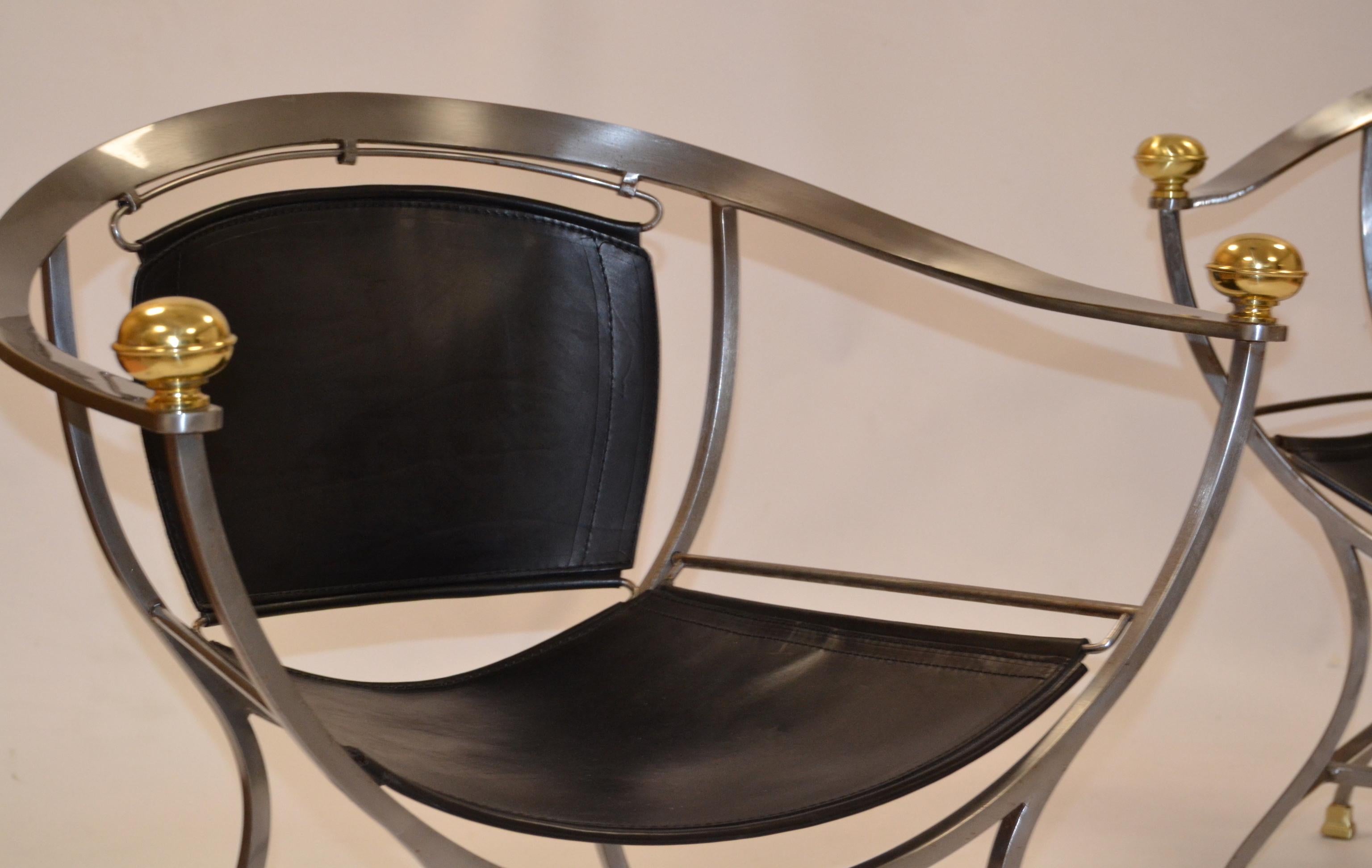 Two armchairs 1970s Italian designer Alberto Orlandi
Pair of 1970s steel, bronze and black leather armchairs by the Italian designer Alberto Orlandi
Pompei model.
(May sell one piece).
 