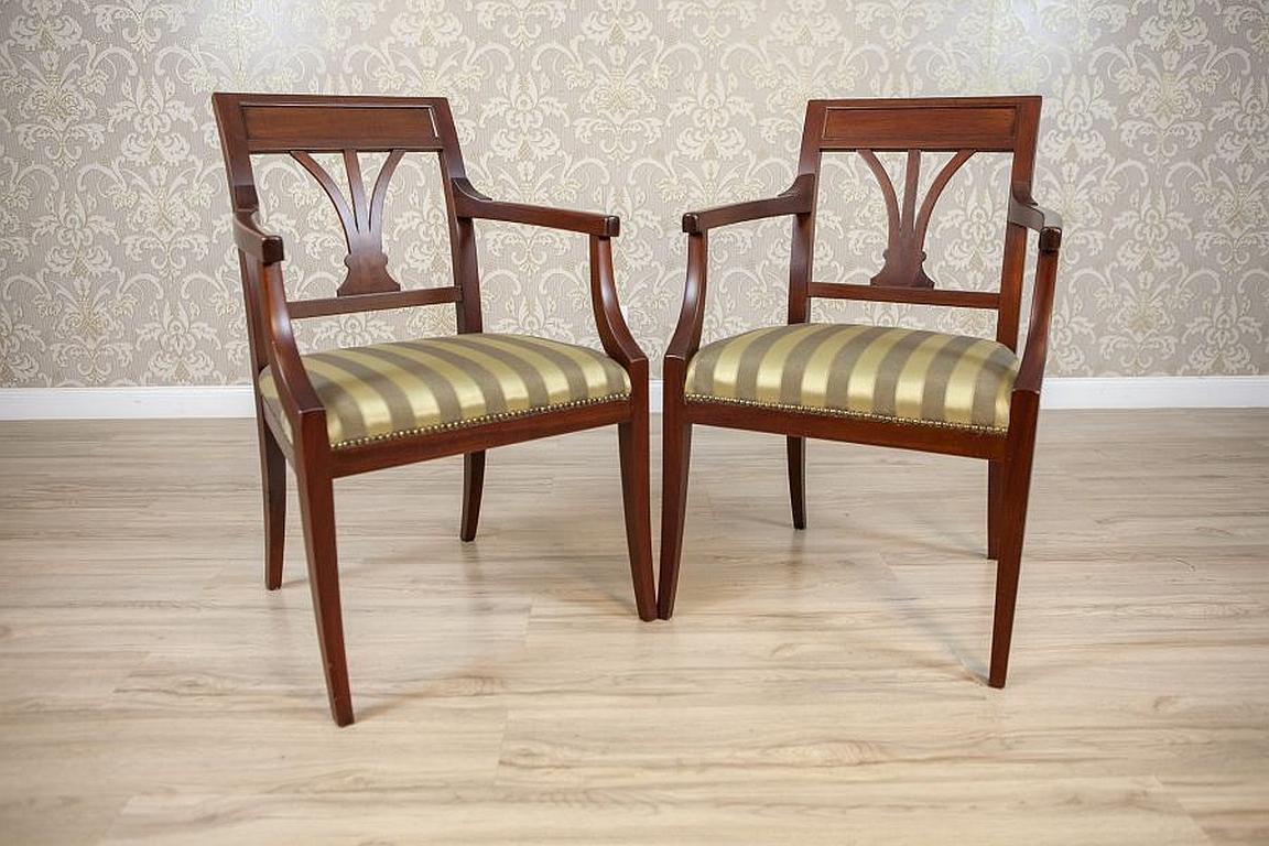 Two Armchairs Circa the 1980s/1990s of Classicizing Forms in Striped Upholstery

We present you two elegant armchairs which shape resembles that of Classicism.
The furniture is contemporary, stylized as antique.

These armchairs have undergone