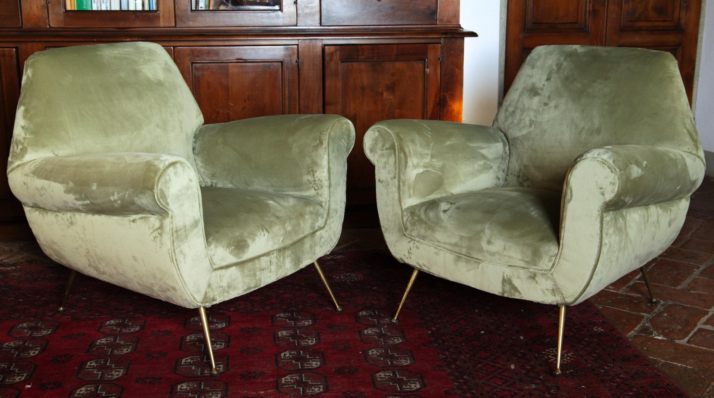 Two armchairs designed by Gigi Radice. Made by Minotti in the 1950s.

From a apartment in central Rome, wood structure was made firm, padding replaced, belts replaced and upholstered with an Italian woven green high pile sage green writing