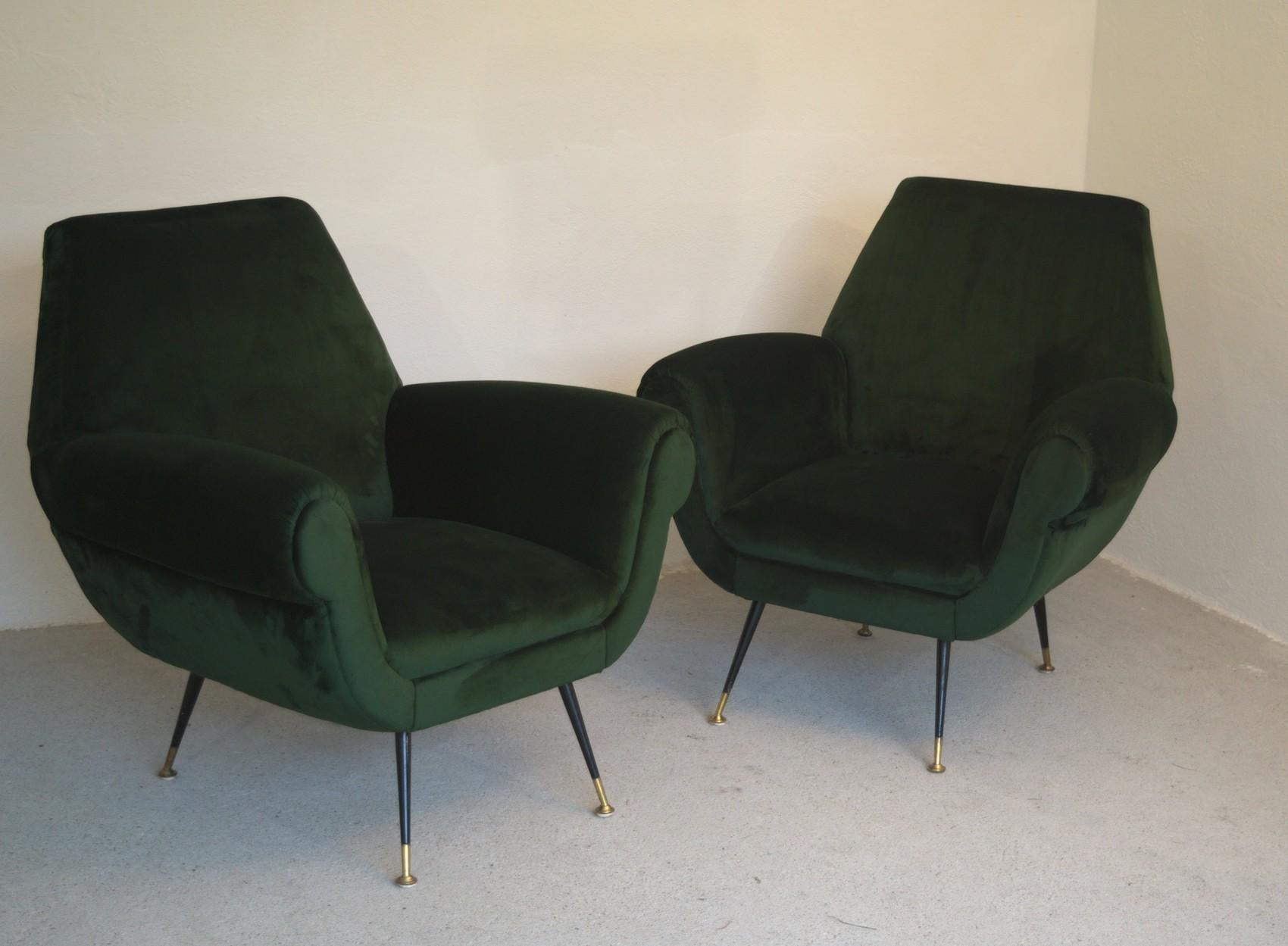 Two armchairs designed by Gigi Radice. Made by Minotti in the 1950s.

From a villa in Padua, wood structure was made firm, padding replaced, belt replaced and upholstered with an Italian woven green high pile soft deep forest green writing velvet.