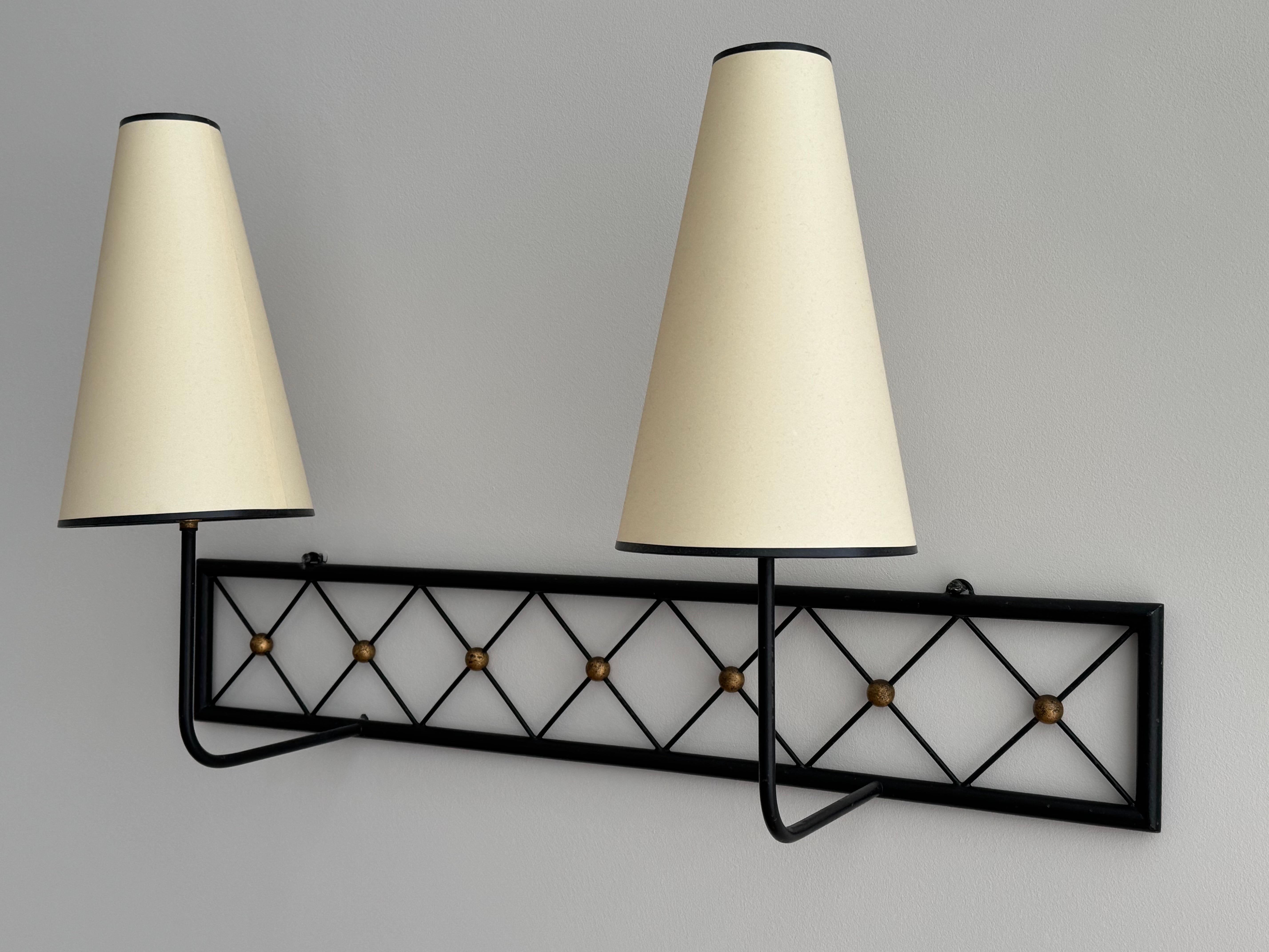 Metal Two-arms Tour Eiffel wall light in black painted and gilt metal For Sale