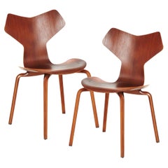 Two Arne Jacobsen Grand Prix Chairs, no 4130, in Teak, with Rare Provenance.