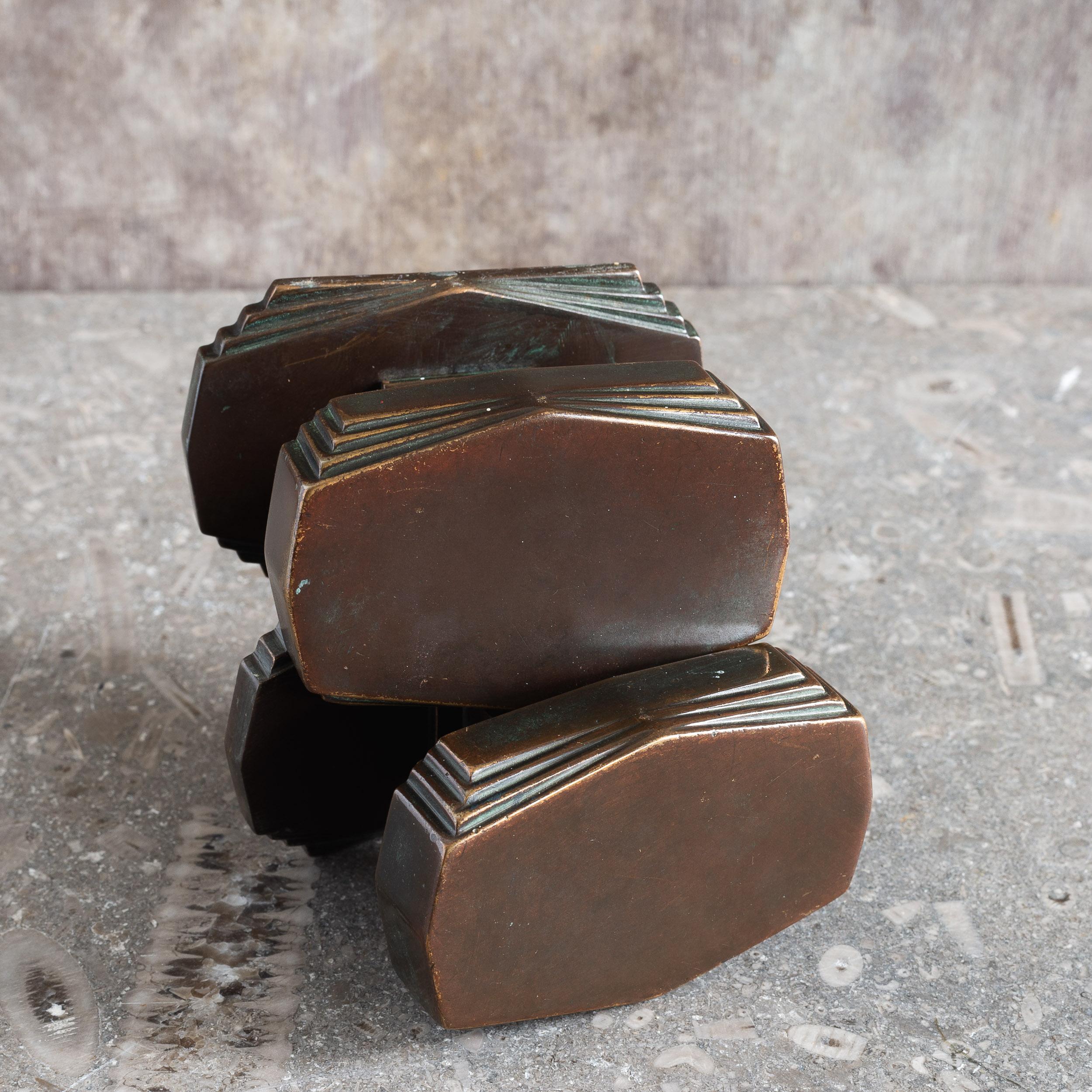 Two English Art Deco bronze centre pulls, sold individually.