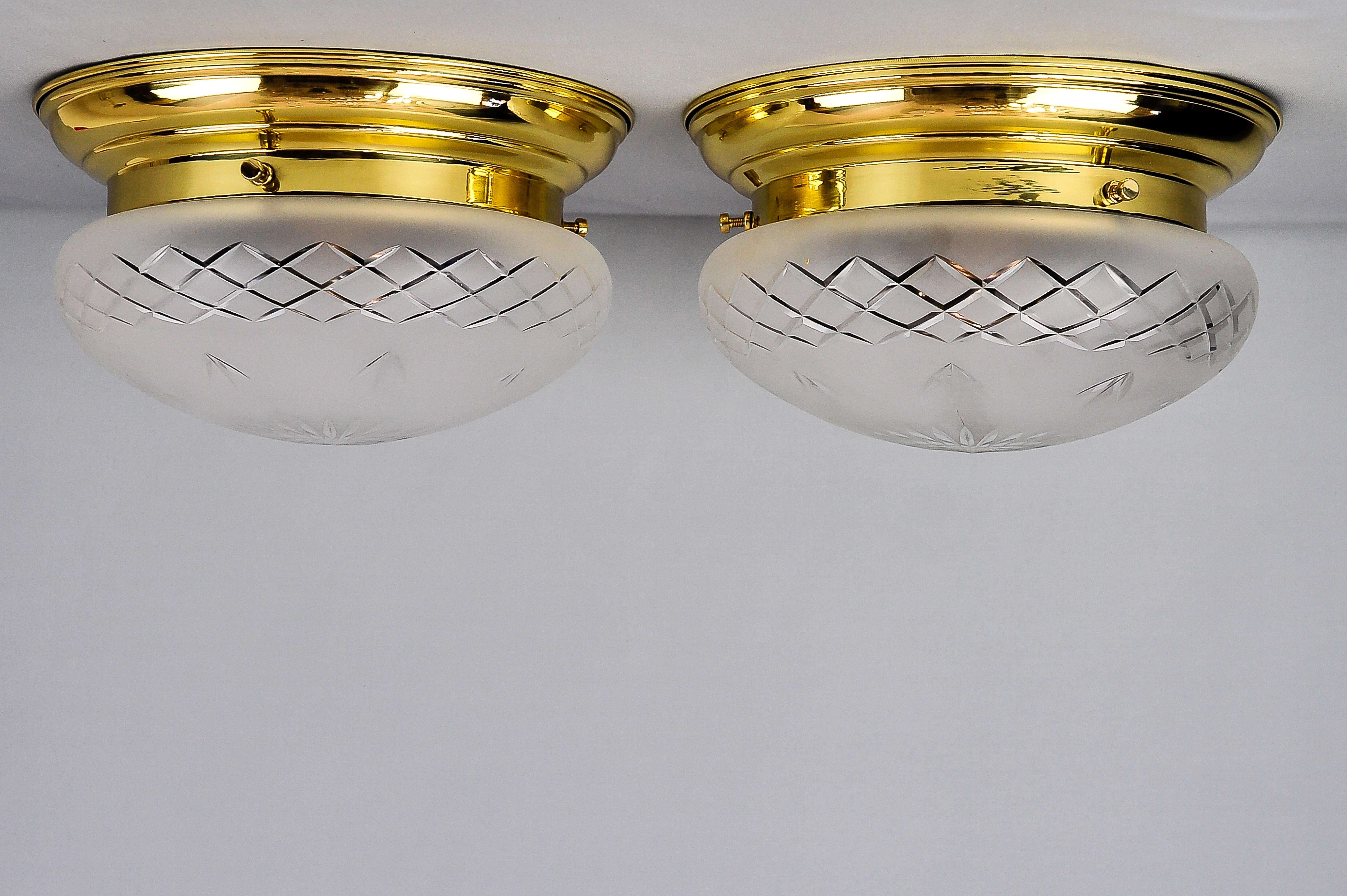 Two Art Deco ceiling lamps circa 1920 with original glasses
Polished and stove enamelled.