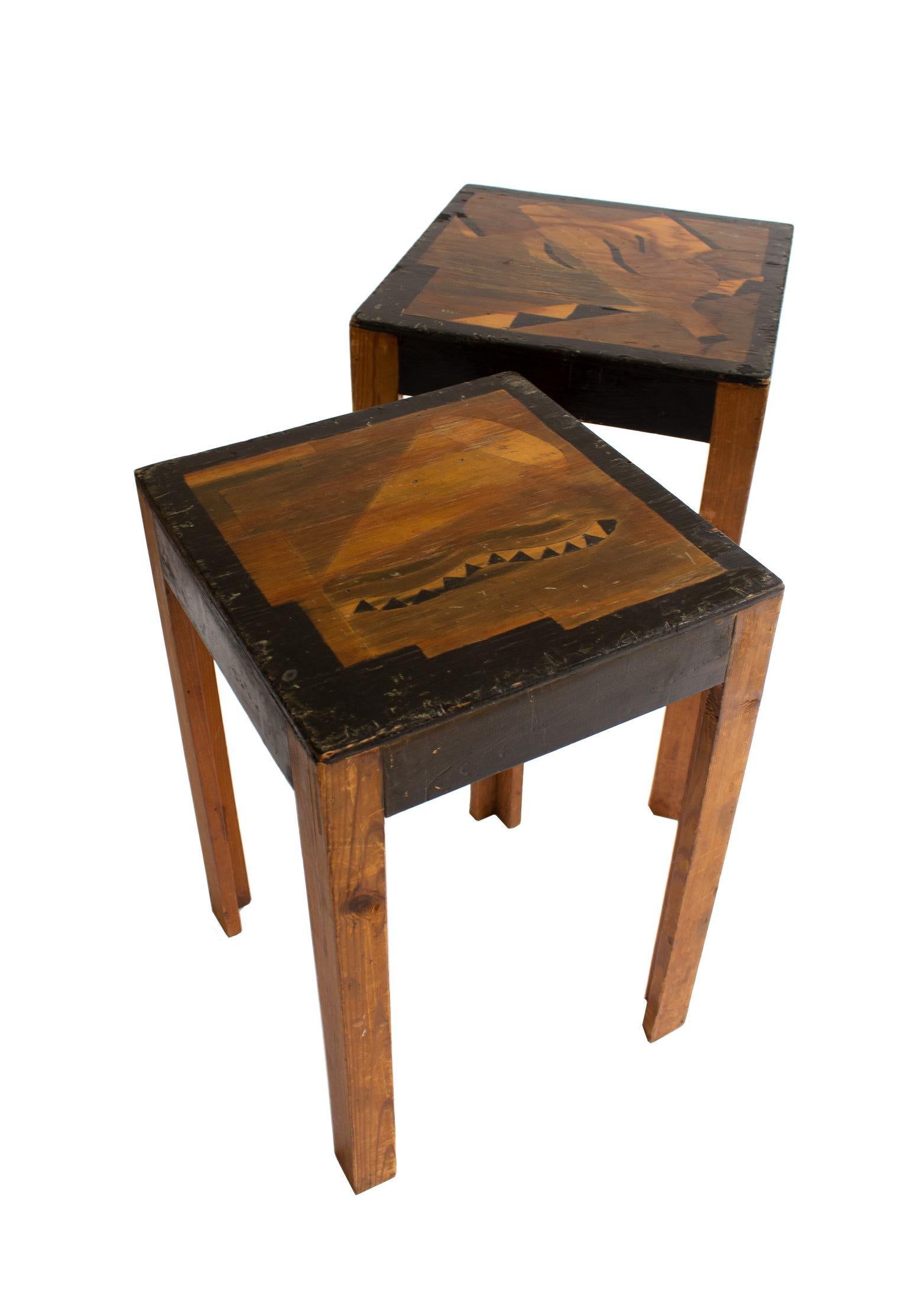 Two charming, Art Deco, nesting tables made of unknown Swedish artist in 1930s-1940s.
The layout and design of the table top is inspired by the genre of abstract art and are bound to look great in a home combined with multiple curiosity things.