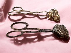 Dos pinzas de plata Art Nouveau para servir pasteles, Alemania, 1900