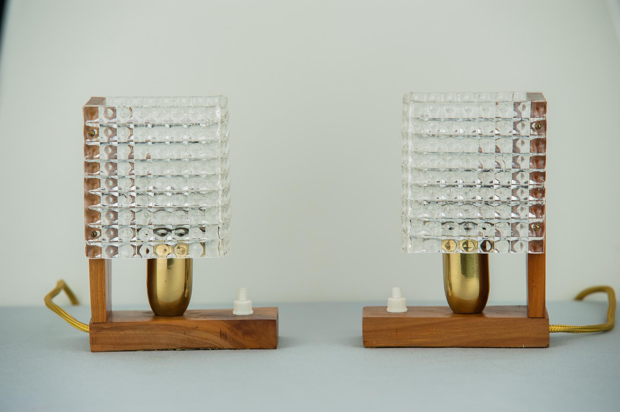 Two Austroluxe table lamps, circa 1960s 
Nutwood original condition
Lucite original condition.
 