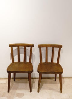 Two Axel Einar Hjorth "Utö" chairs, manufactured for Nordiska Kompaniet