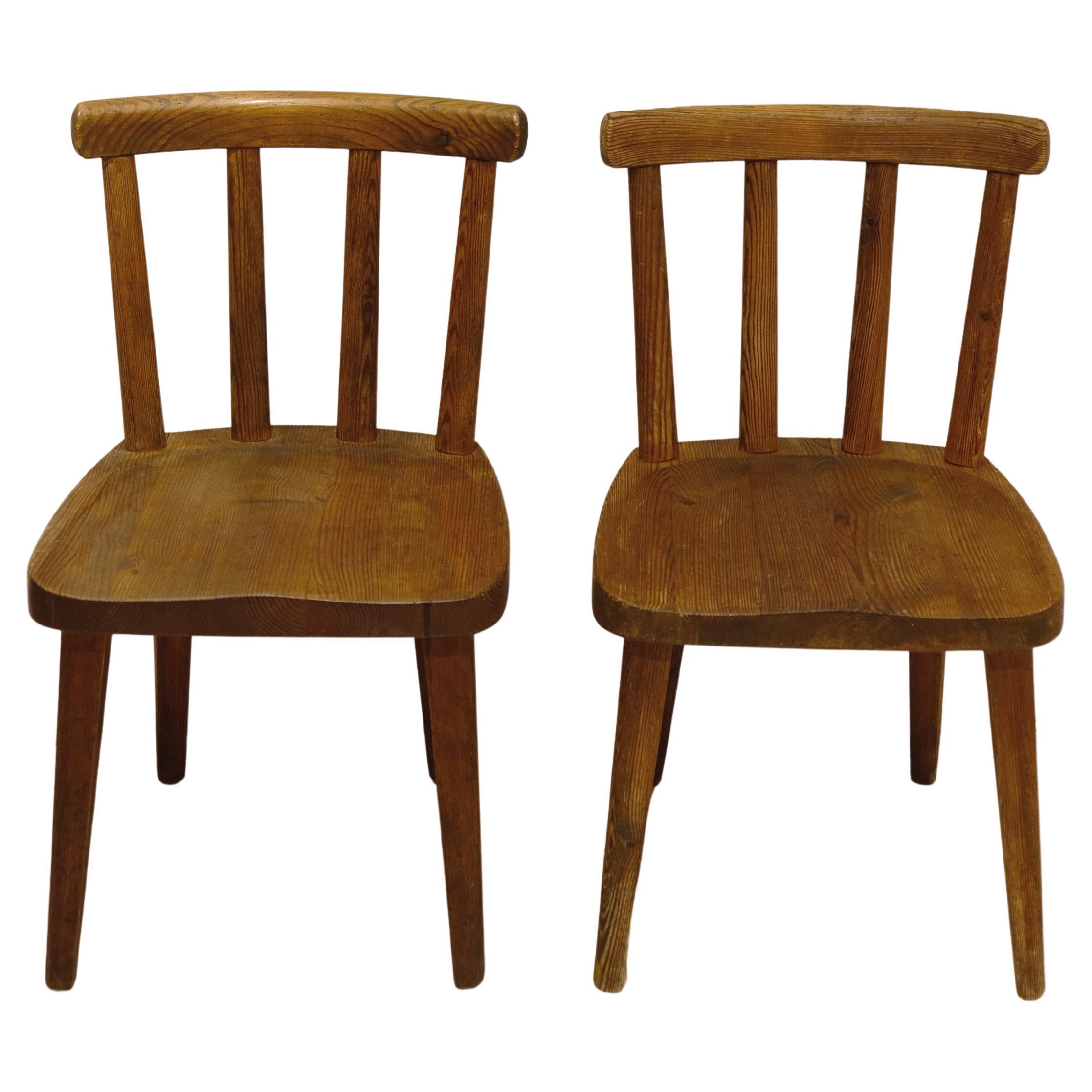 Two Axel Einar Hjorth "Utö" chairs, manufactured for Nordiska Kompaniet