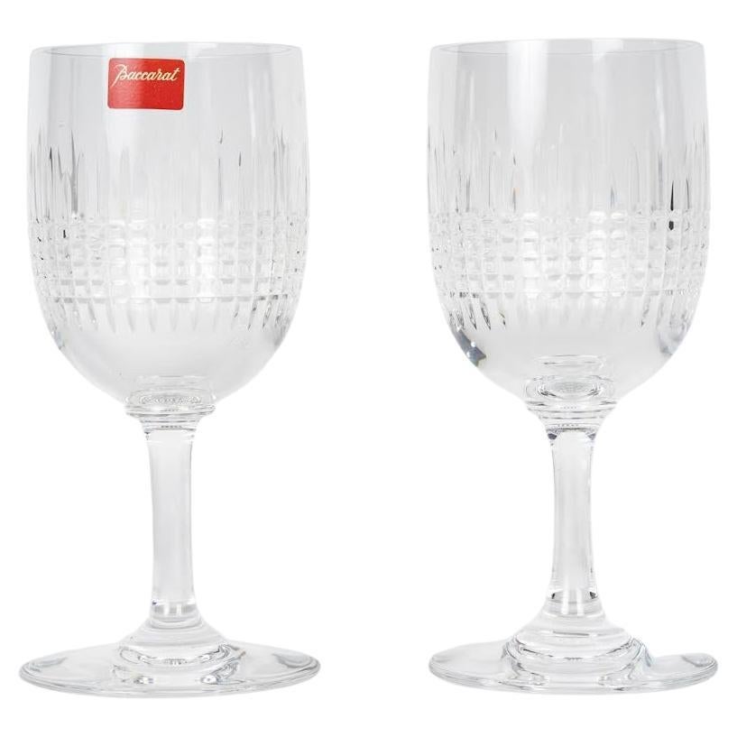 Due bicchieri di cristallo Baccarat per un Tête à Tête, 20° secolo.