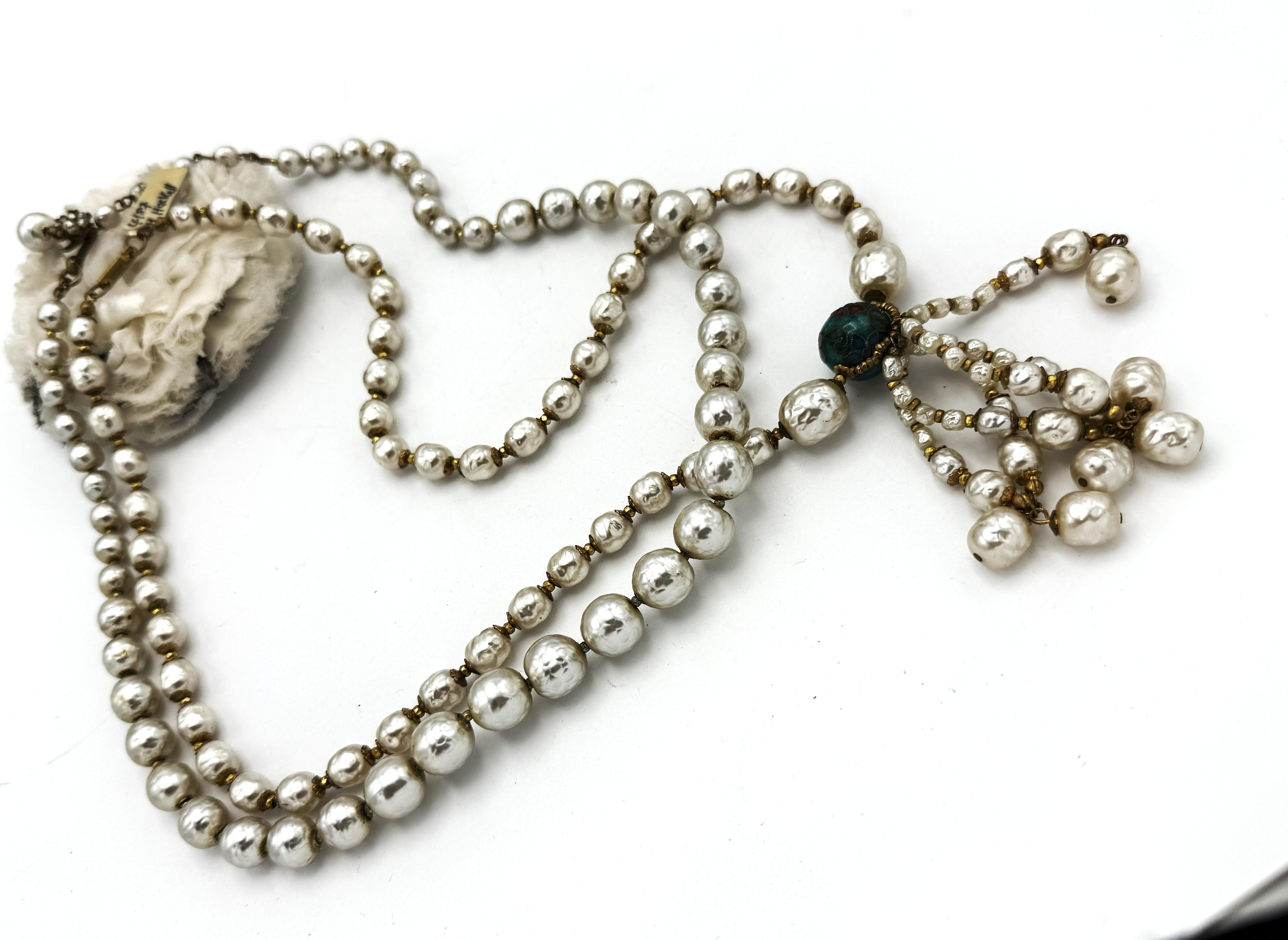 Taille ronde Two baroque pearl necklaces by Miriam Haskell US from the 1950s one with tassels en vente