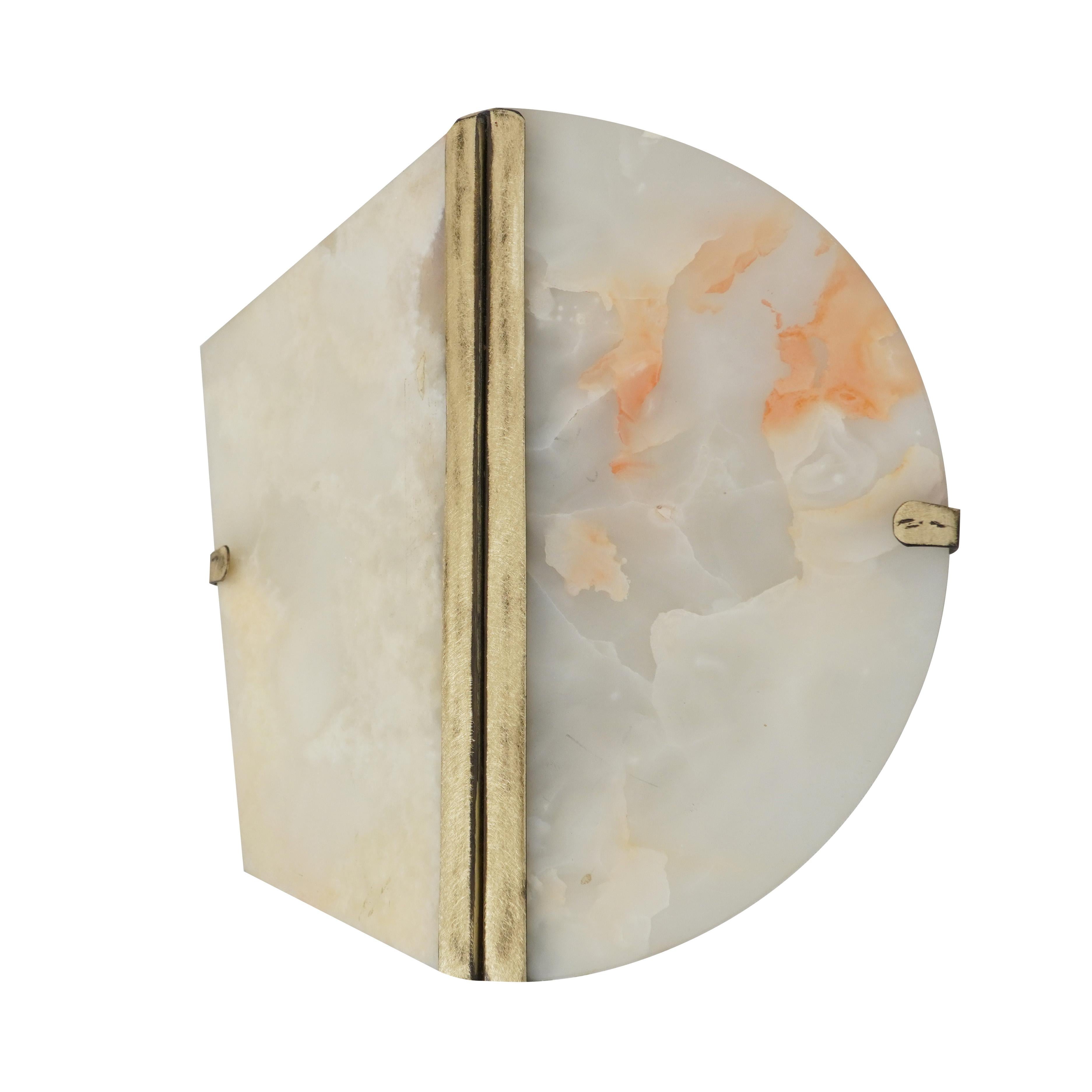 TWO-BE wall light onix stone

Entirely made in Tuscany, Italy.
This object is a -always beautiful– piece to décor interiors from Classic to Contemporary style.

The heart of Two-Be, designed by Sabrina Landini are made of polished brass, to