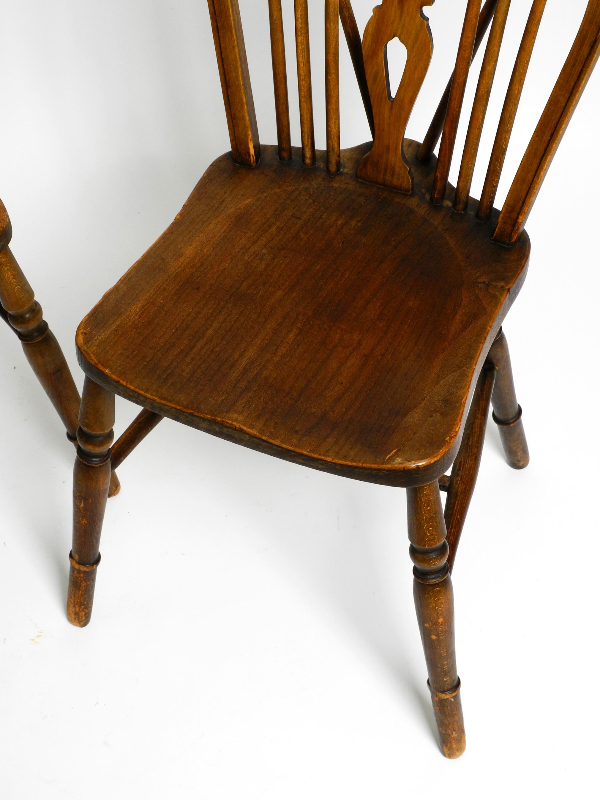 Two beautiful 1930s English Windsor chairs made of beech and elm wood