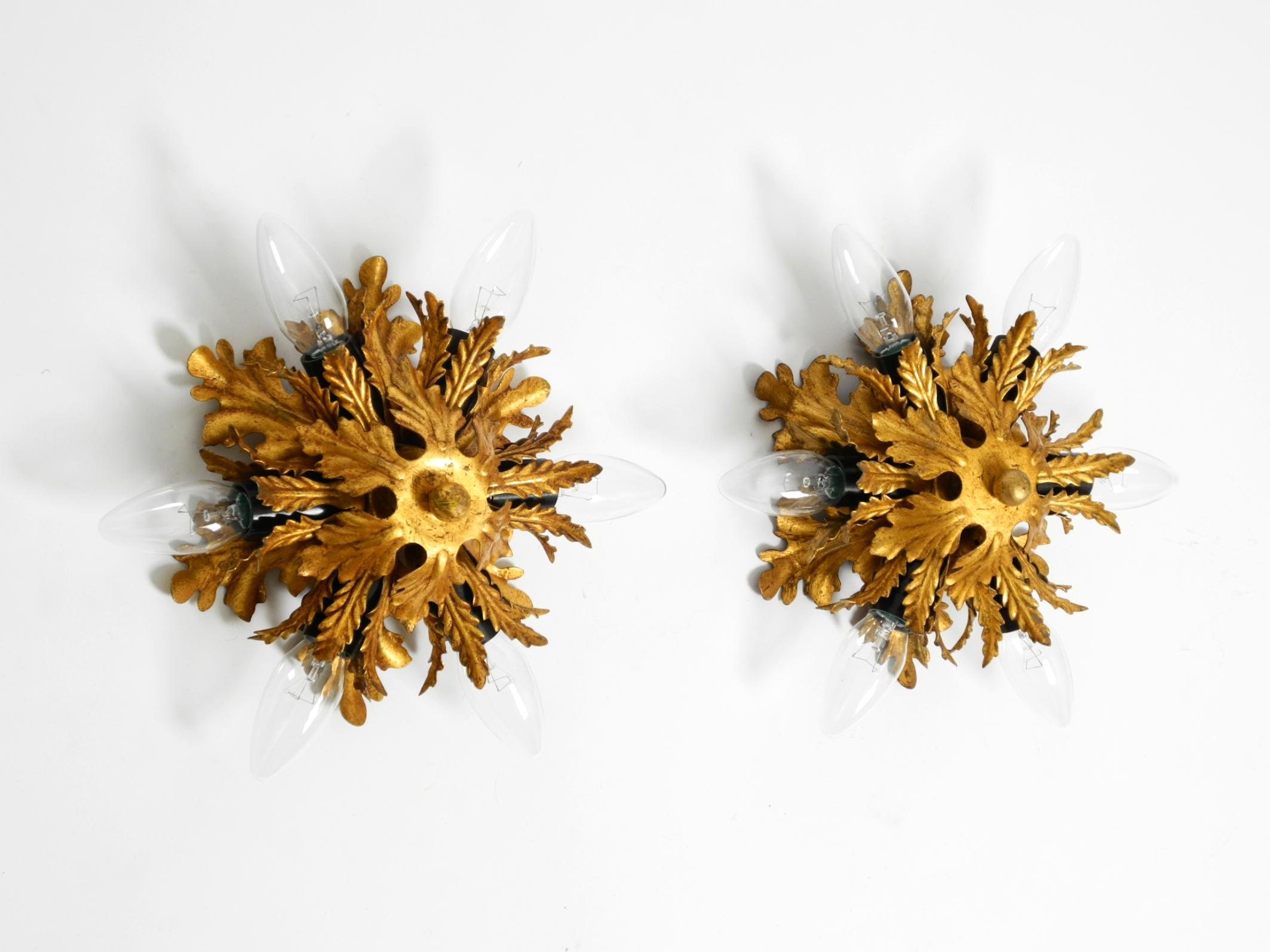 Set of two elegant, rare 1960s Florentine wall or ceiling lamps.
Manufacturer is Banci Firenze. Made in Italy.
Very elegant Italian design, made entirely of gold-plated metal.
Each of both lamps has six E14 sockets.
Fully functional. All two lamps