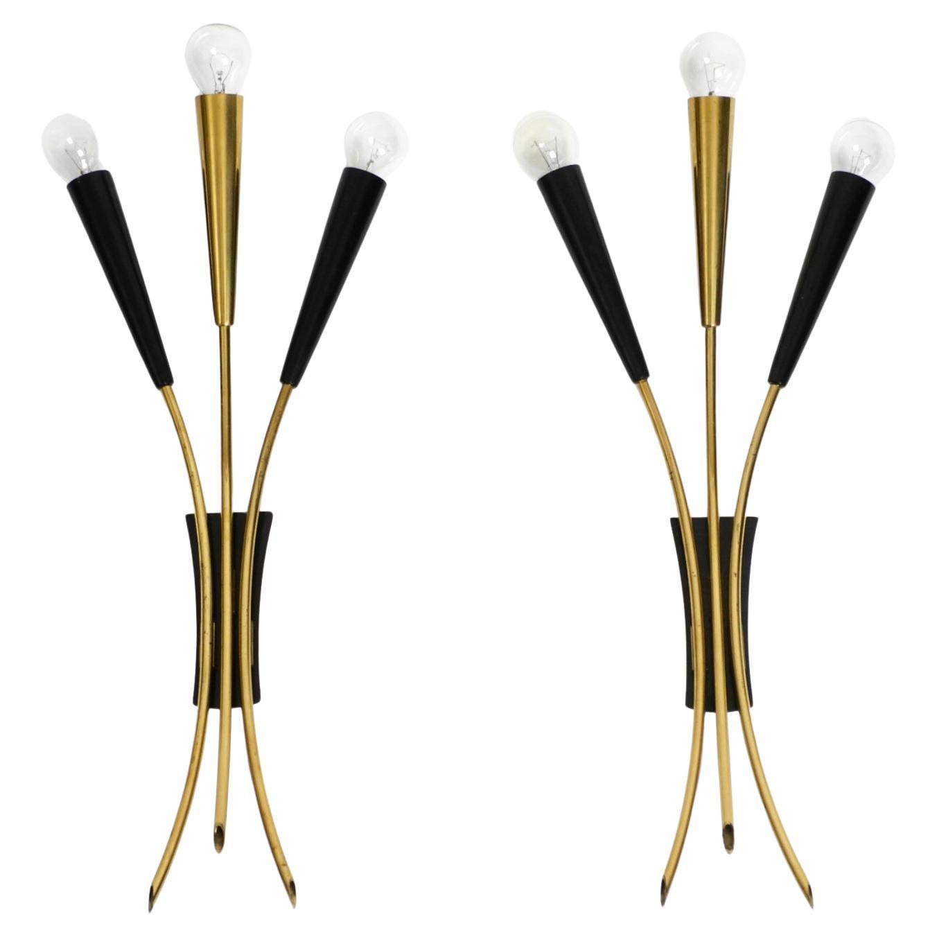 Two beautiful large Mid Century Modern brass 3-light cone wall lamps