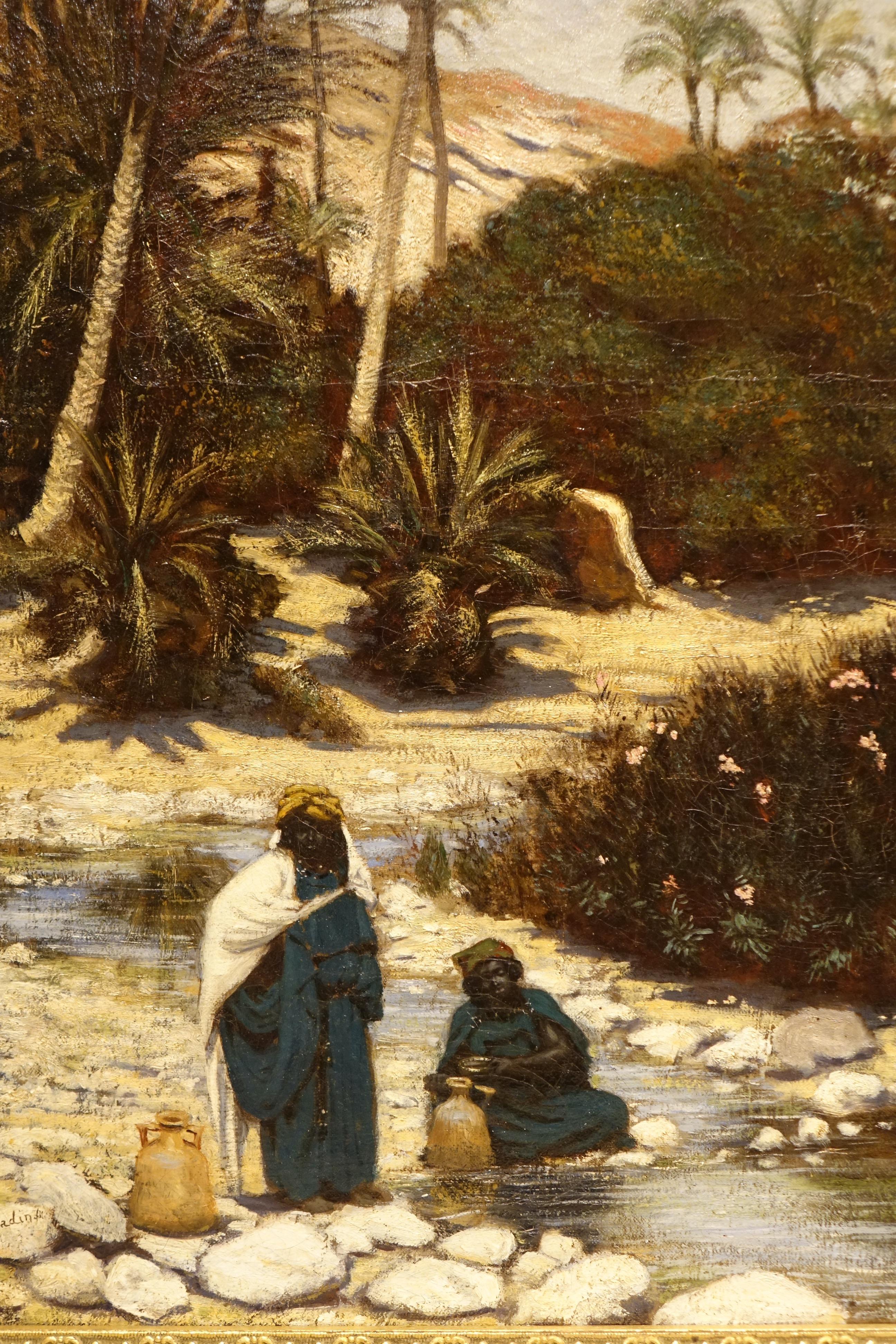 Canvas Two Bedouin women at the bank of a wadi