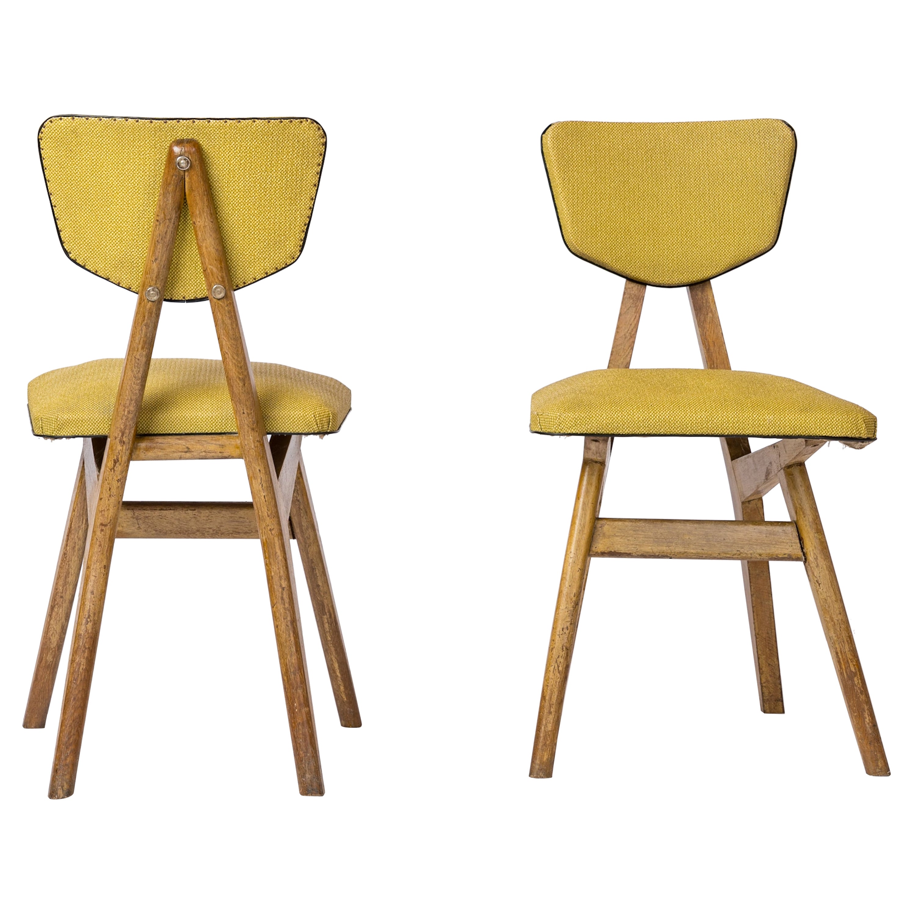 Two Beech 
Yellow Leatherette Chairs by Ligne Roset - France 1950s