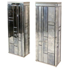 Deux armoires latérales à miroir biseauté