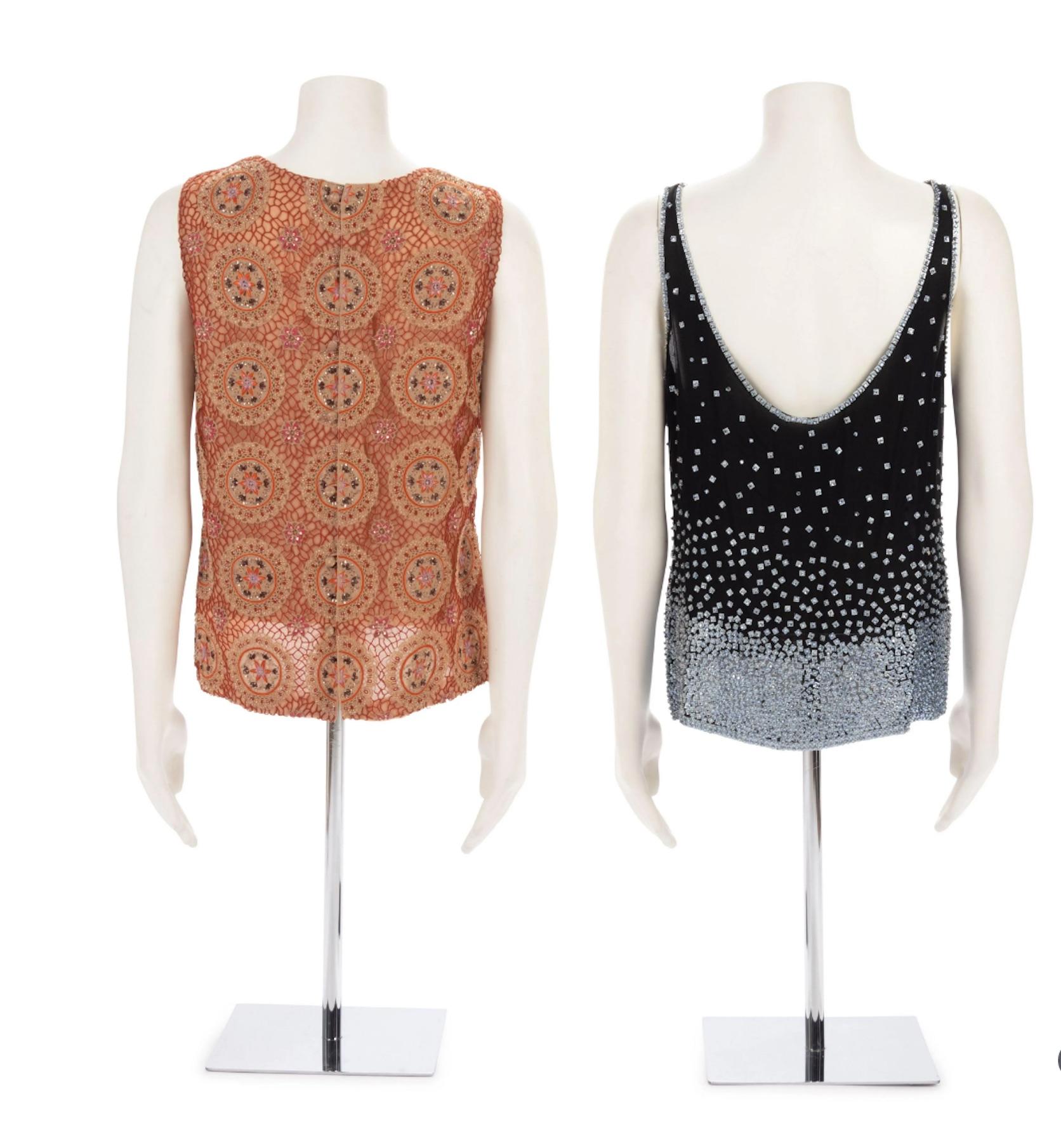 Two Bill Blass Couture Beaded Tops.  New Still Retaining Their Original Pricetags.  Priced Per Top.

THE FIRST
Nude silk chiffon with red thread circle embroidered jewel neck sleeveless top embellished with beads and faceted sequins, and center back