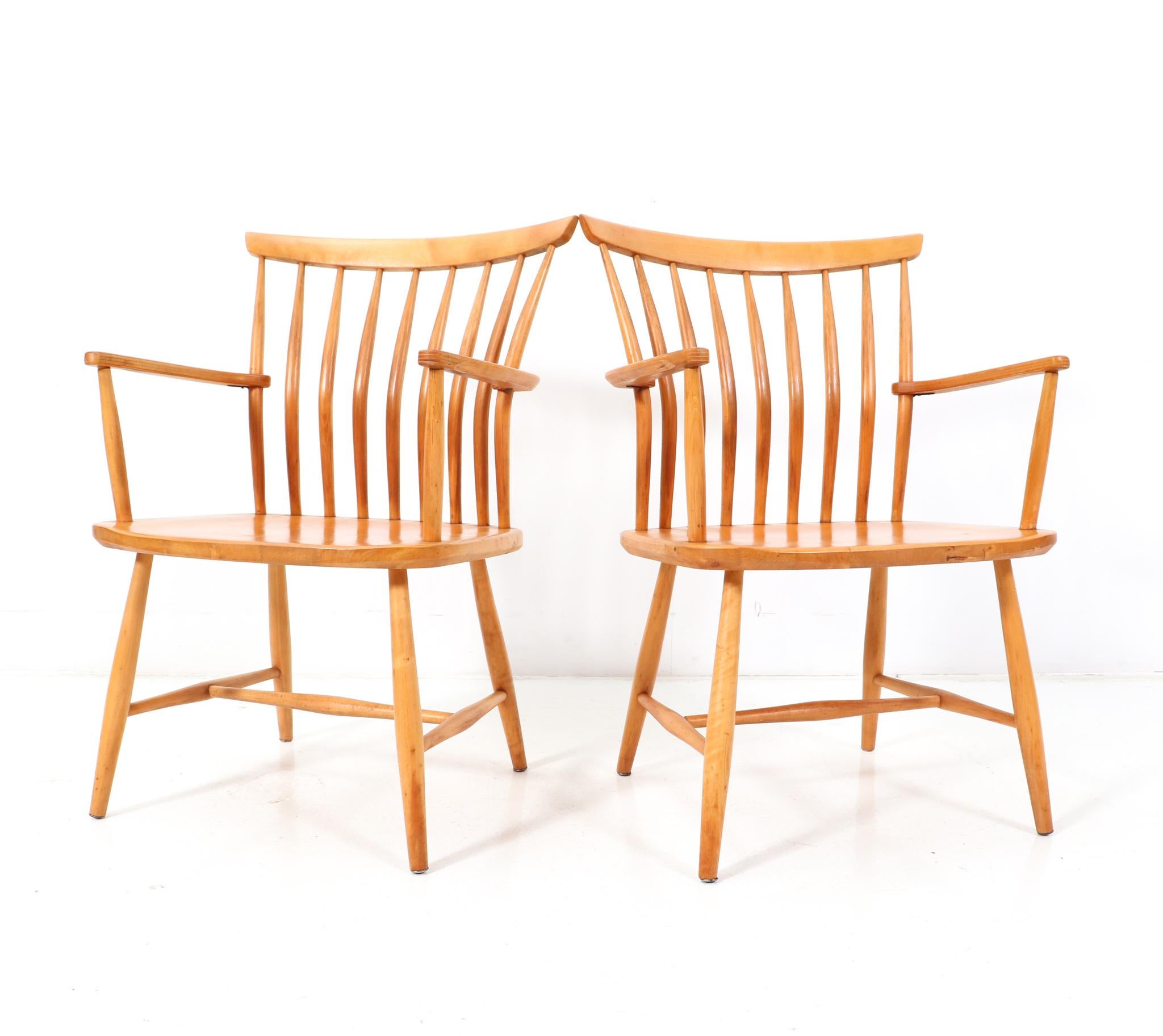 Amazing and rare pair of Mid-Century Modern armchairs.
Design by Bengt Akerblom and Gunnar Eklöf for Akerblom.
Striking Swedish design from the 1950s.
Solid birch frames and both armchairs are marked with the original manufacturers label.
This