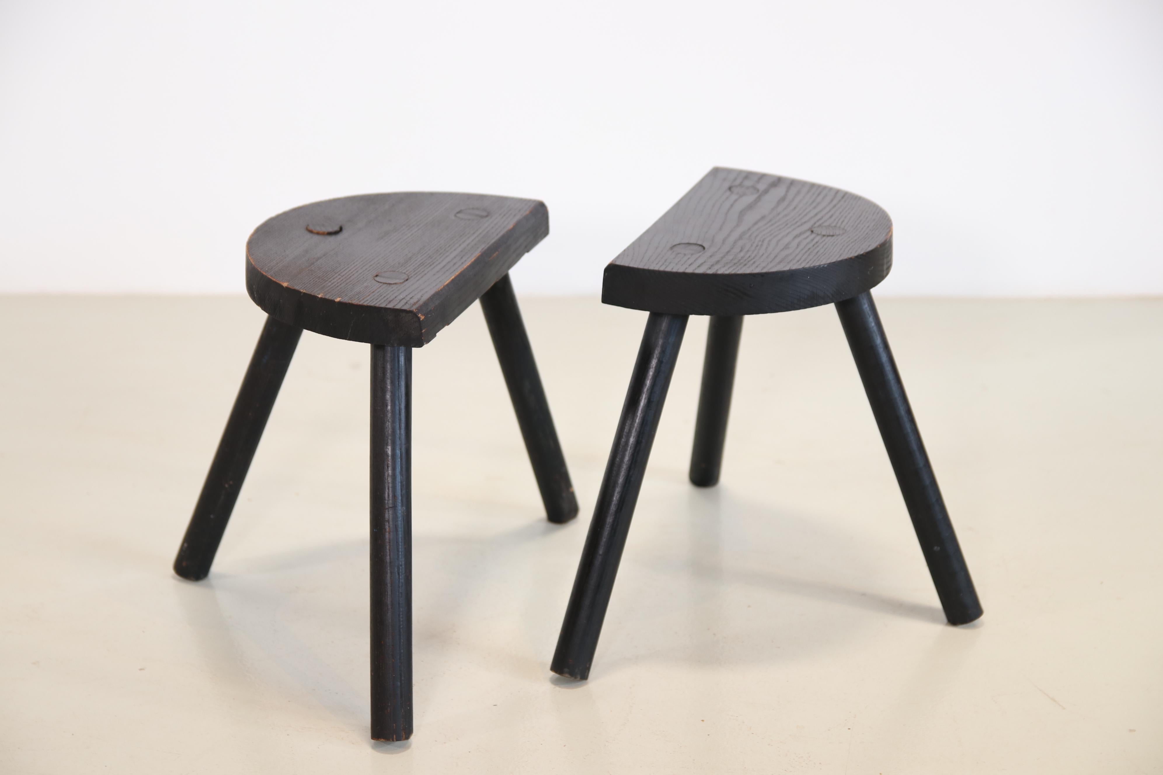 Lacquered Two black French Brutalist tripod stool Rustic milking stools, 1940's For Sale