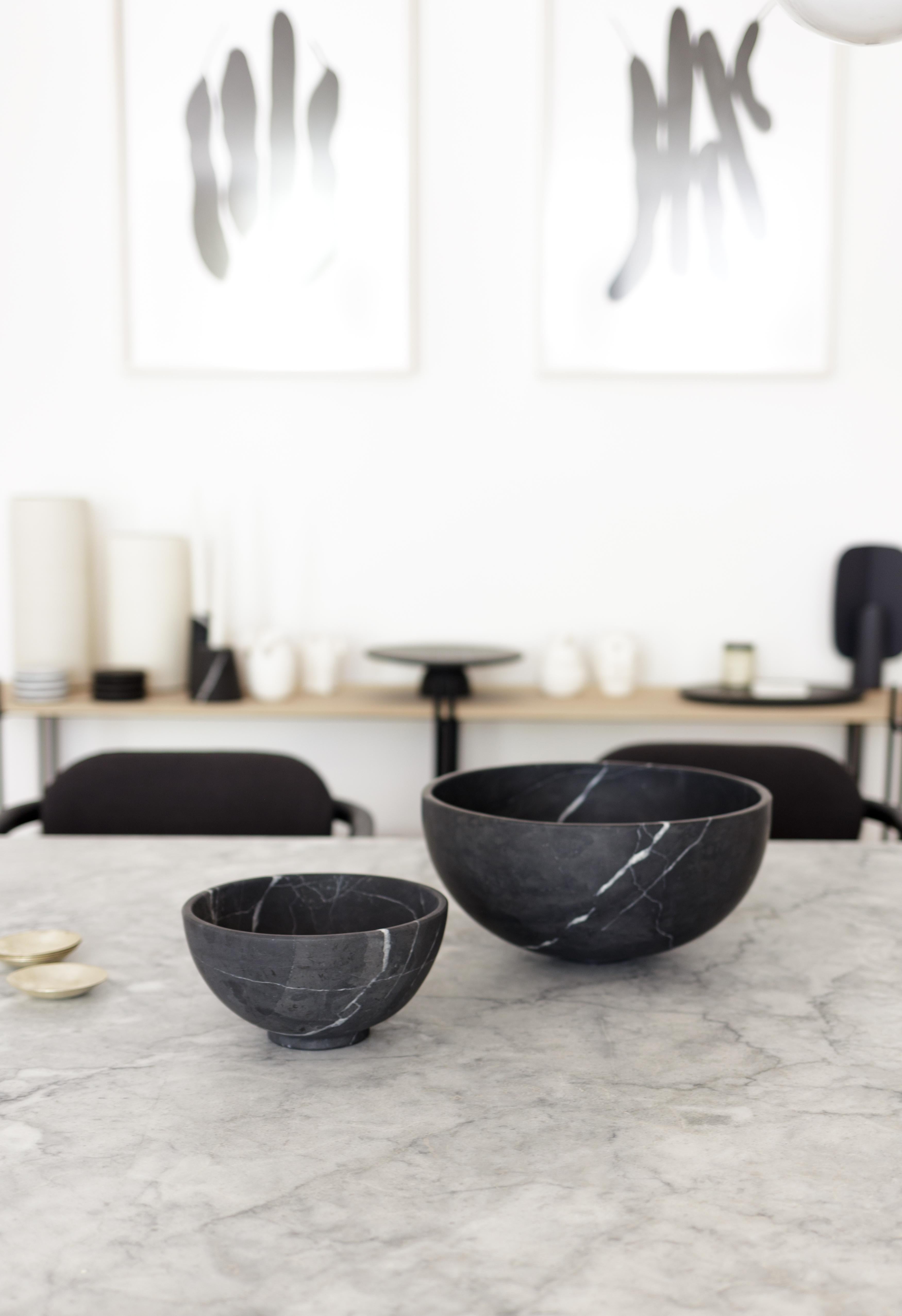 Large and small bowl in carved Monterrey black marble. Set of 2. Handmade in Mexico by local craftsmen.   Dimensions:  Small: 20 D x 20 W x 10 H cm Large: 30 D x 30 W x 15 H cm.  Production time: 6-8 weeks for items without marble / 13-14 weeks for