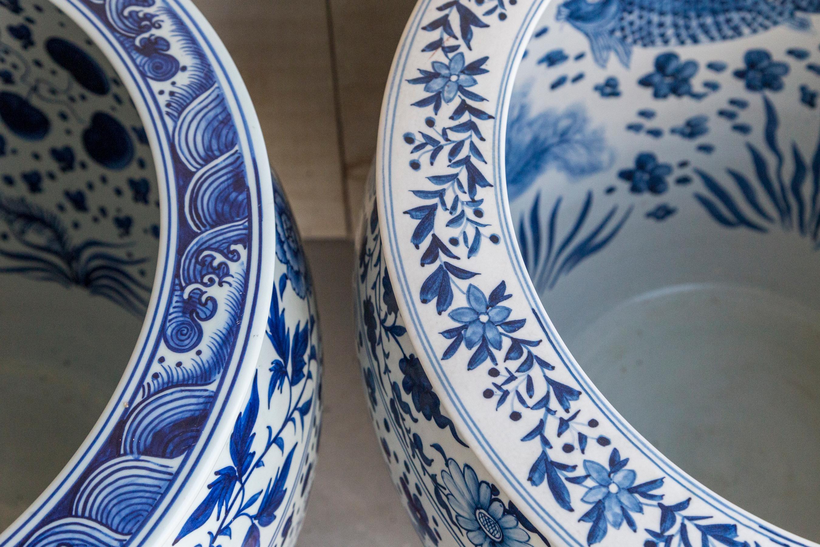 Porcelain Two Blue and White Chinese Planters on Stands For Sale