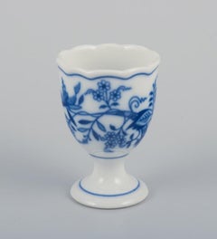 Two Blue Onion egg cups with spoons. Approx. 1920s/30s