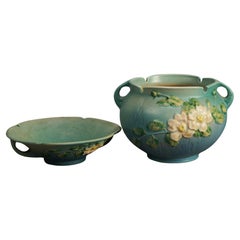 Two Blue Roseville Art Pottery Items with White Rose Pattern Mid 20thC