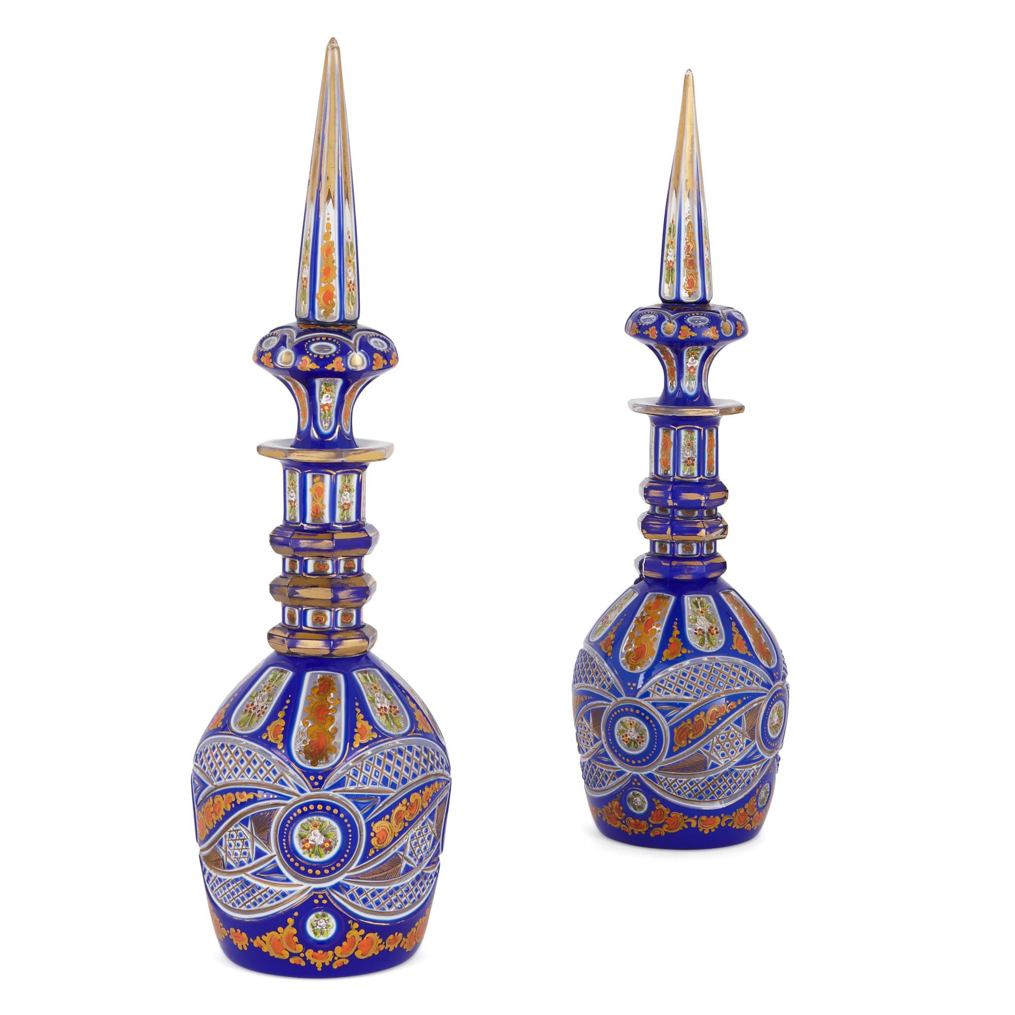Two Bohemian Enamelled Blue Overlay Cut-Glass Decanters