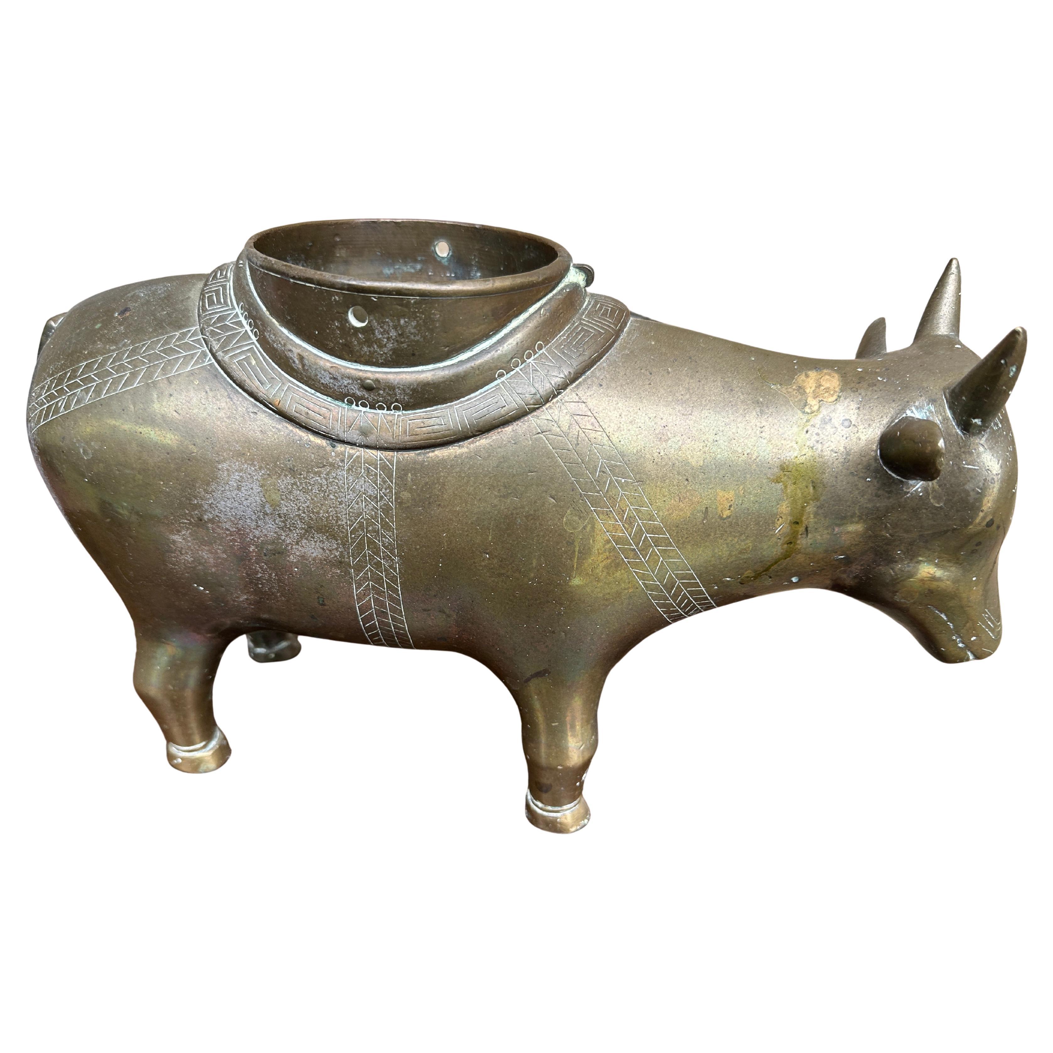 Two Brass Chinese Figures (Ox & Elephant) - W4000

This is a pair of heavy Chinese brass figurines of an ox and an elephant. They are in very good condition with some residue from cleaning in the past (could be wax or brass polish residue). They are