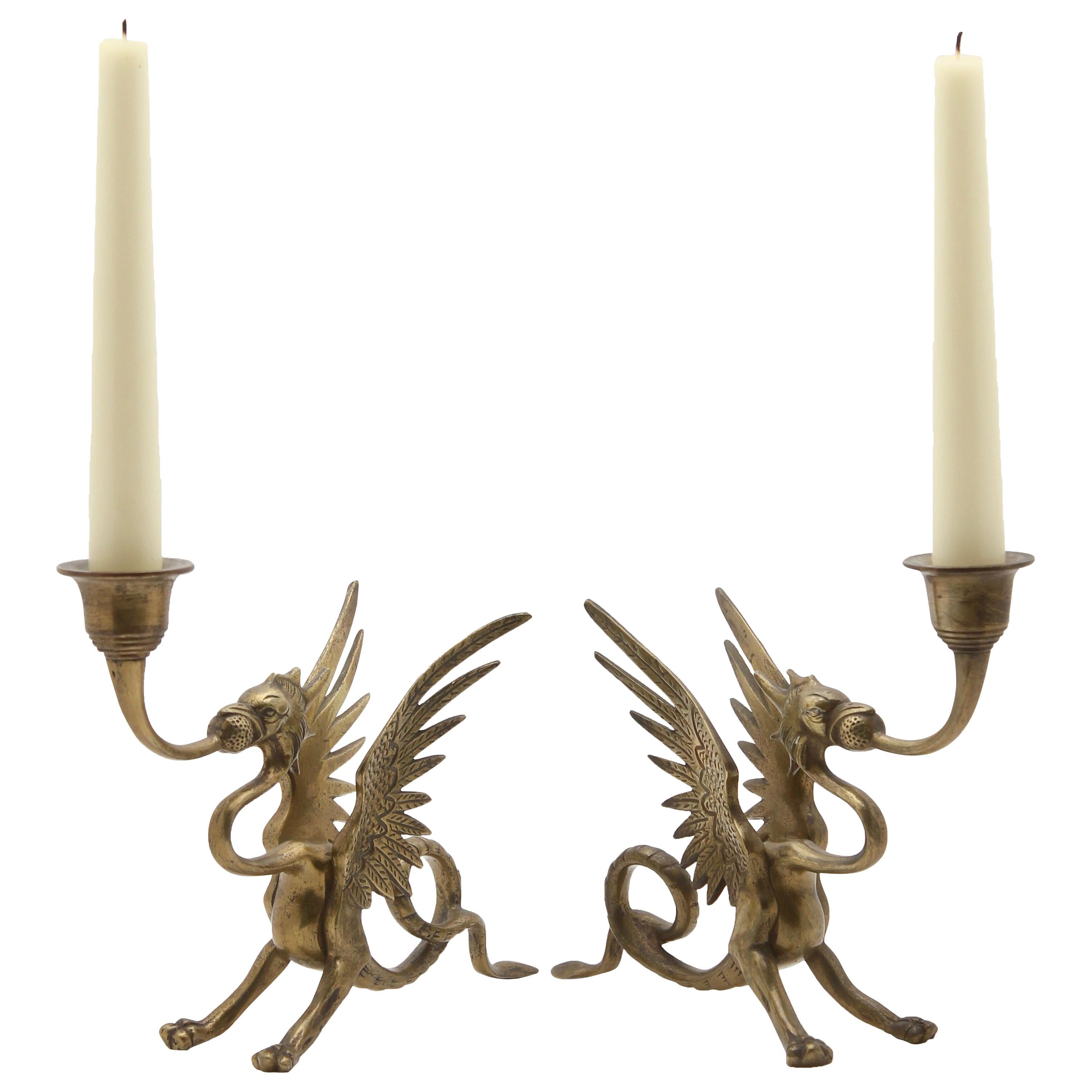 Two Brass Counterbalanced Candlesticks in the Shape of Dragons