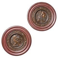 Two Bronze Grand Tour Framed Roundels