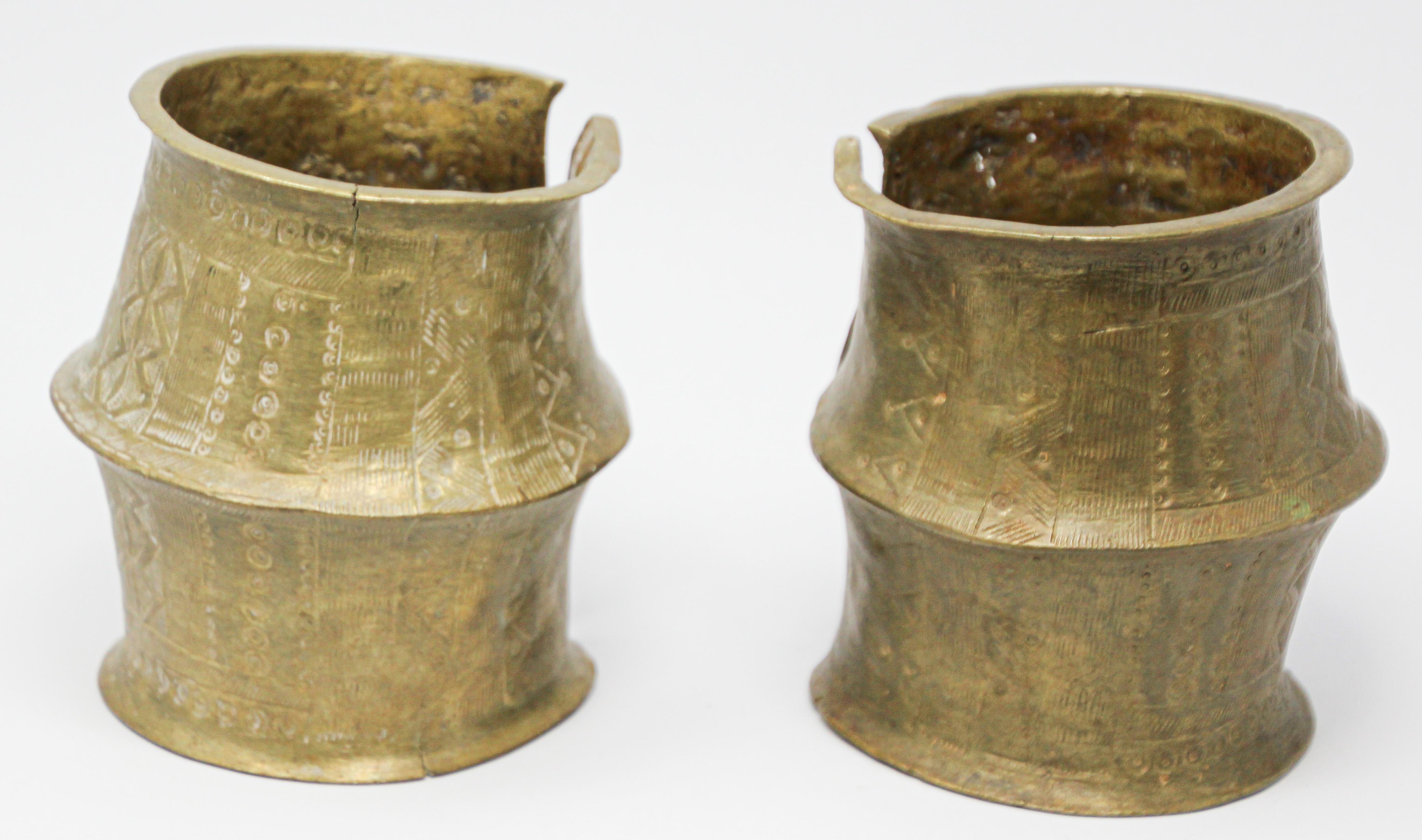 An early 20th century antique African tribal leg band (ankle bracelet), 
These leg bands were both currency and status symbols for the Mongo tribe of northwest Congo. 
They were made by pouring hot bronze and tin into molds set in the ground. Once