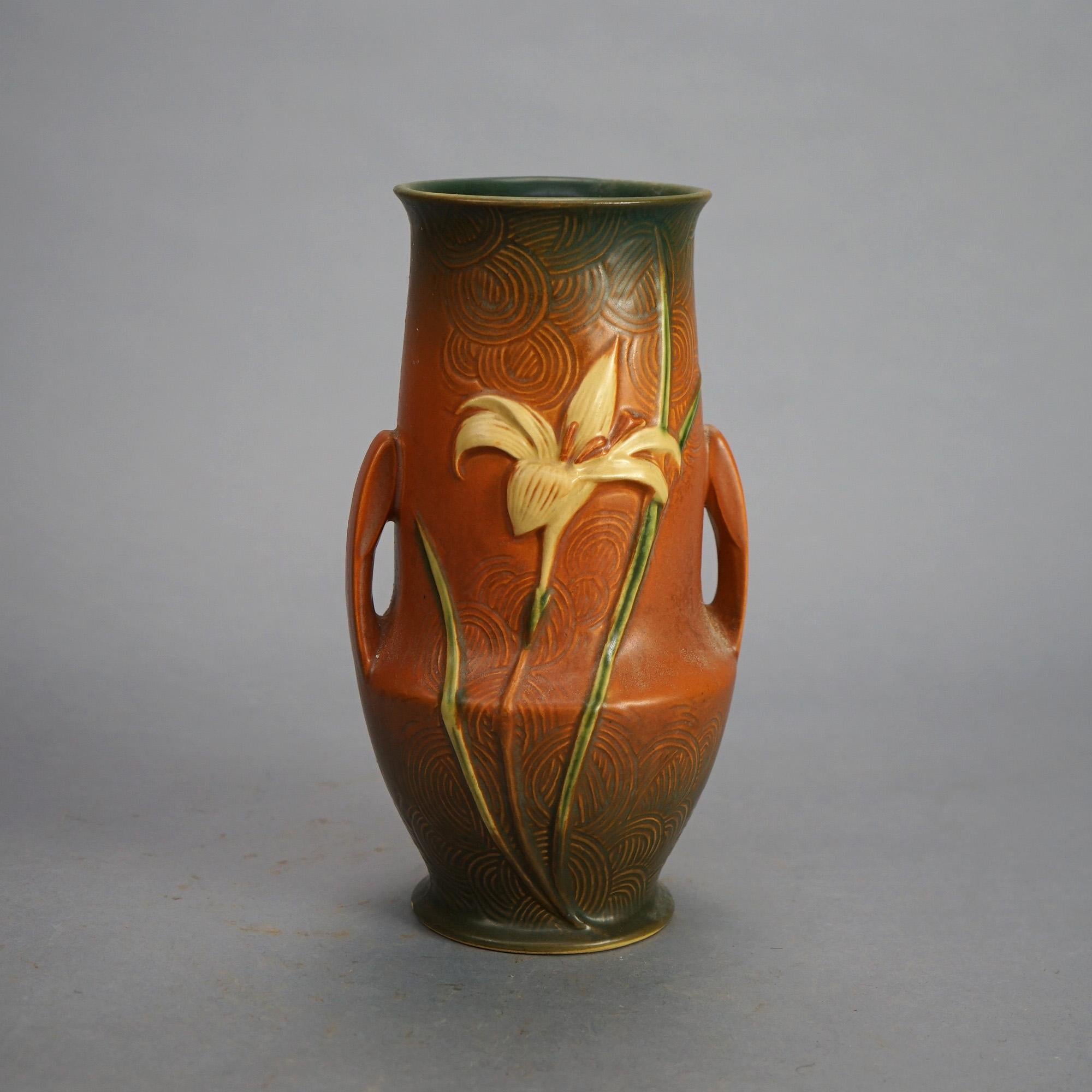 Two Brown Roseville Art Pottery Items with Zephyr Lily Pattern Mid 20th C

Measures- Vase 10.5''H x 5.5''W x 5.5''D